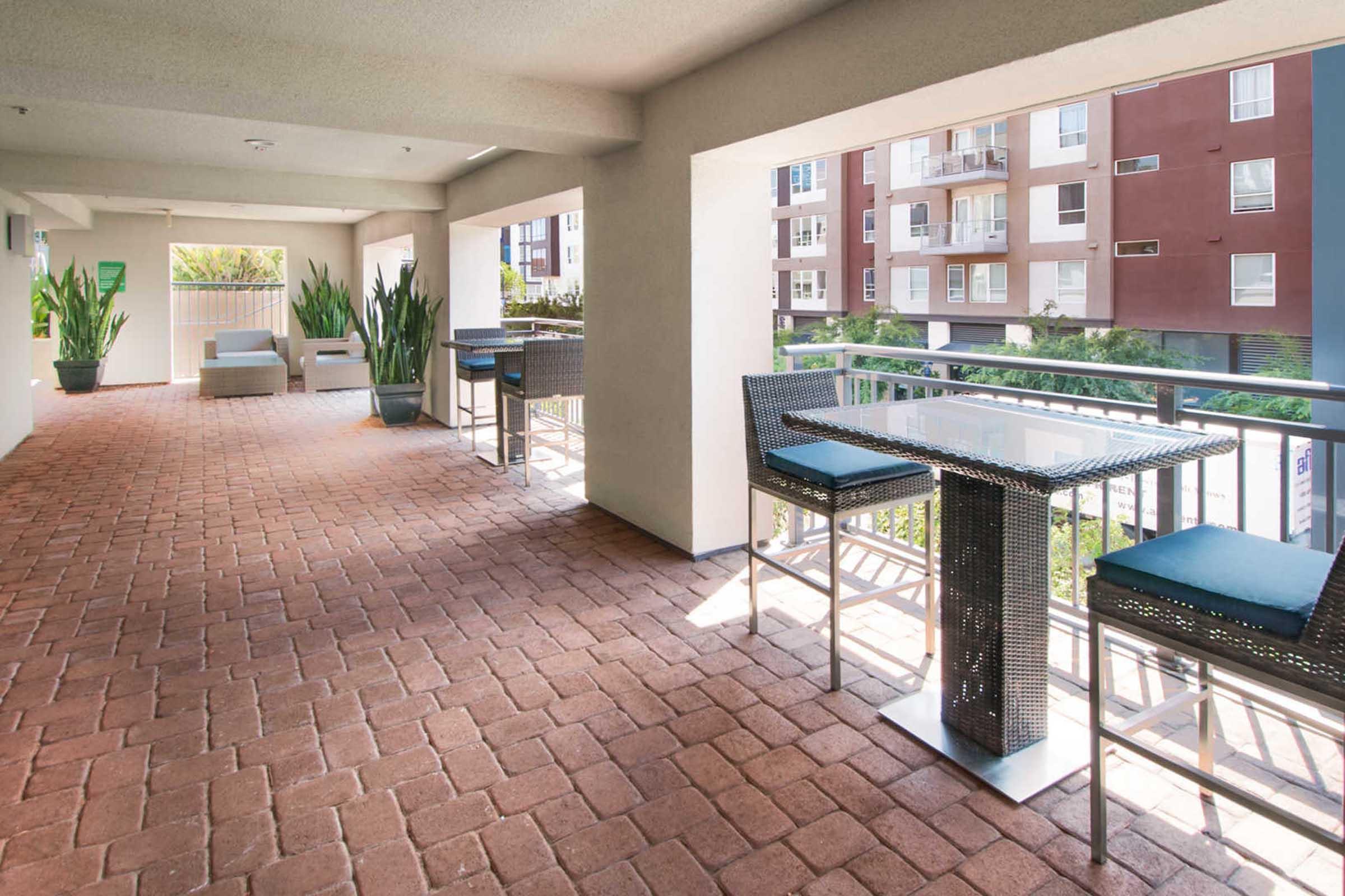 a patio with tables