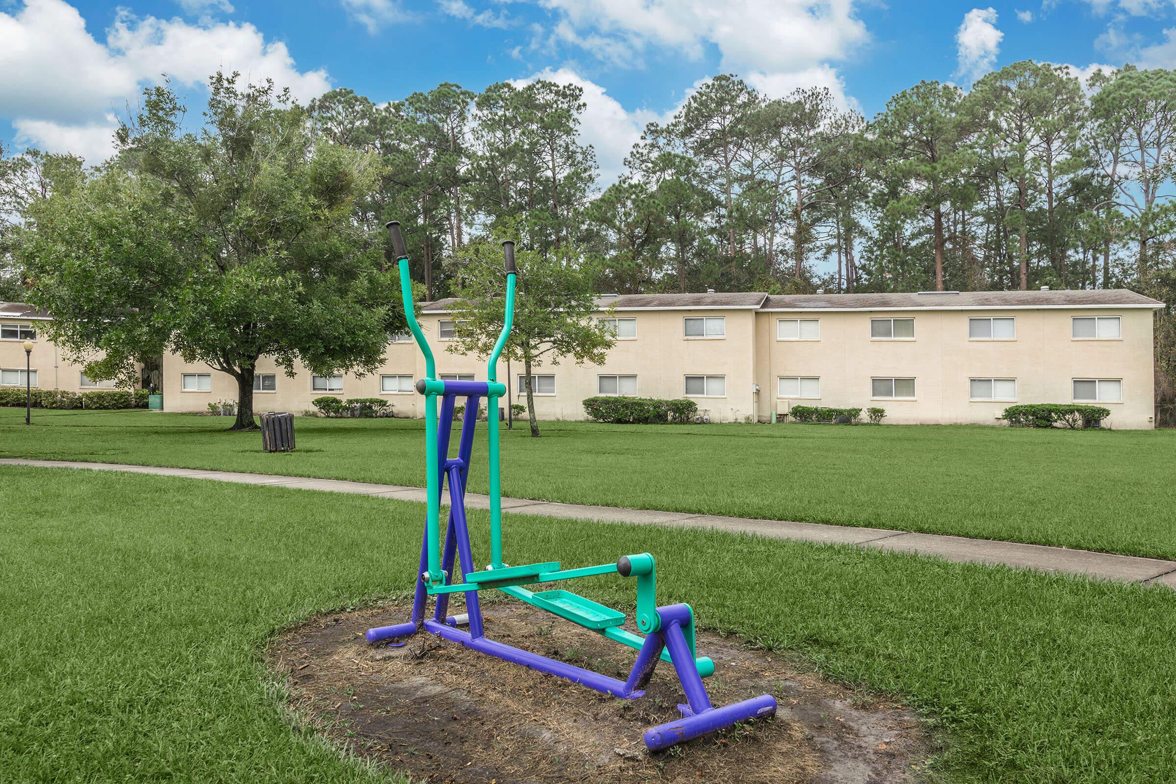 a person flying a kite at the park