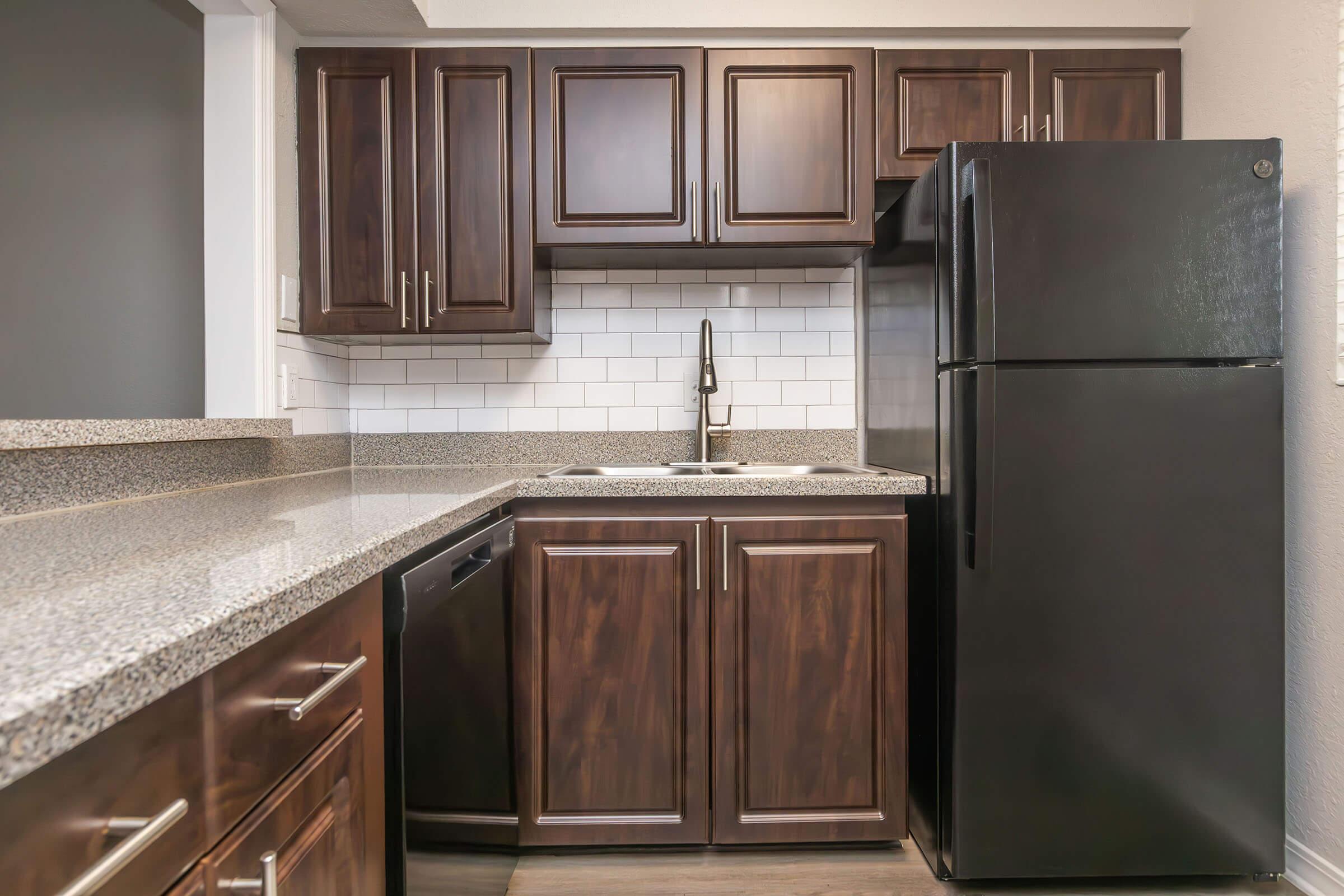 a stainless steel refrigerator in a kitchen