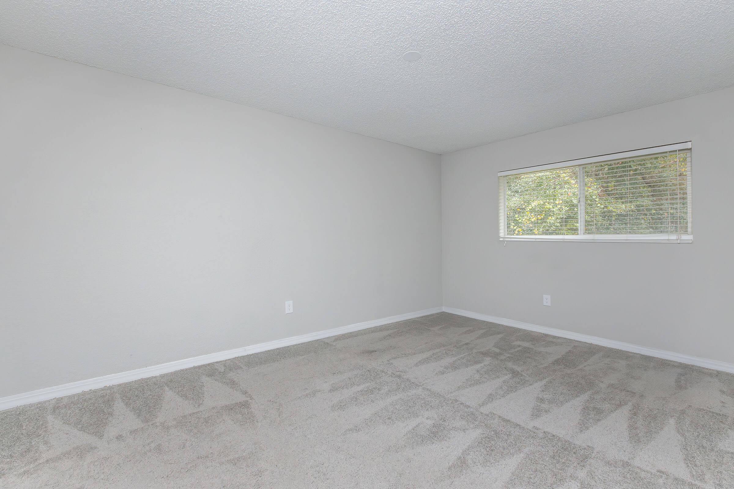 a room with a sink and a window