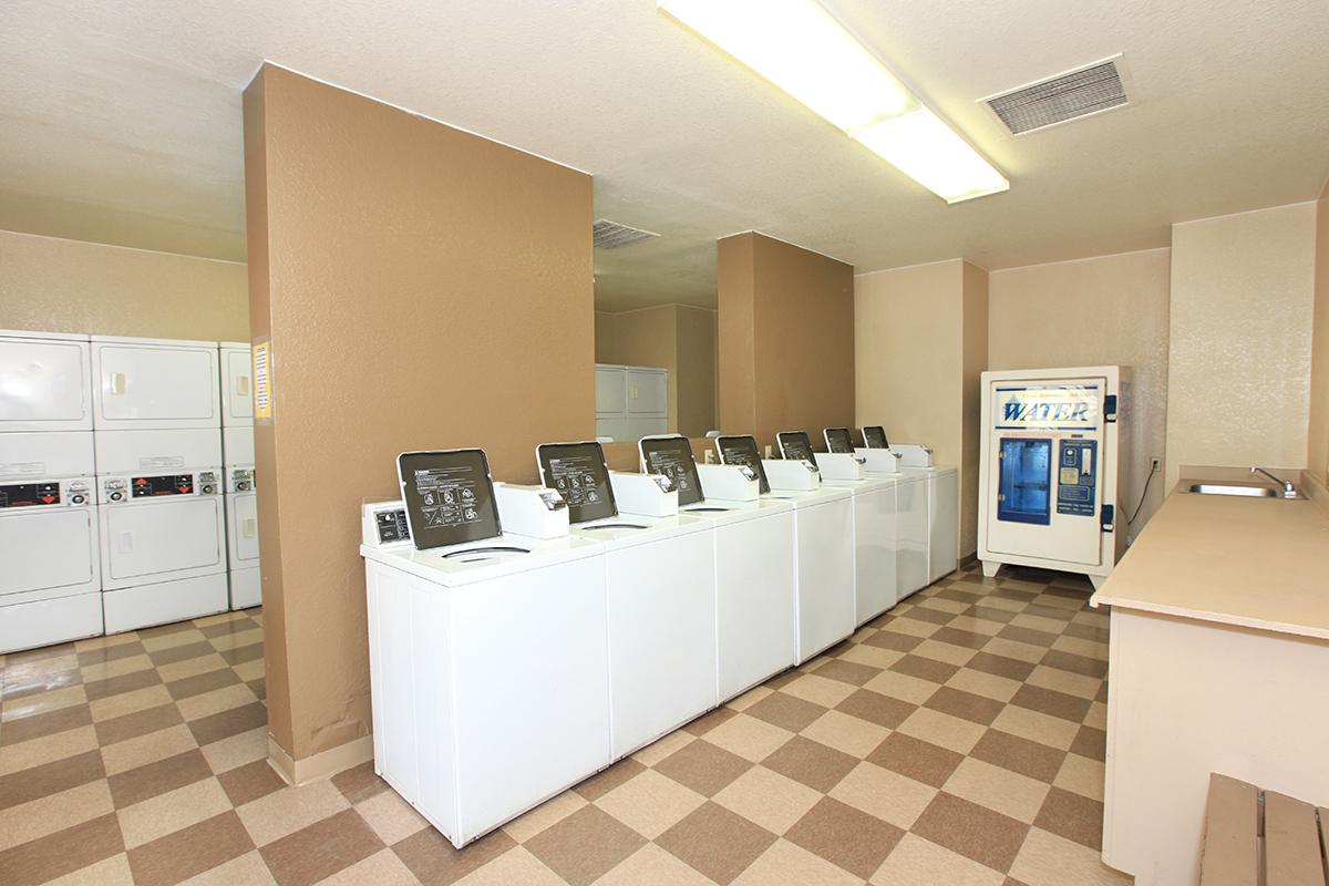 a kitchen with a tile floor