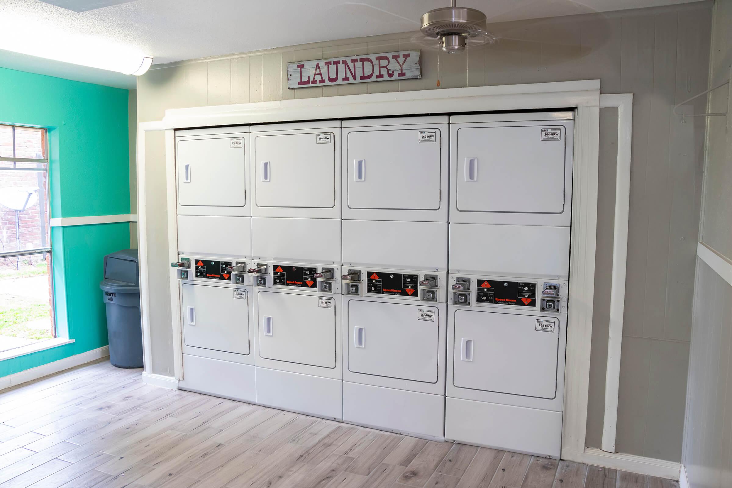 a white refrigerator freezer sitting inside of a kitchen