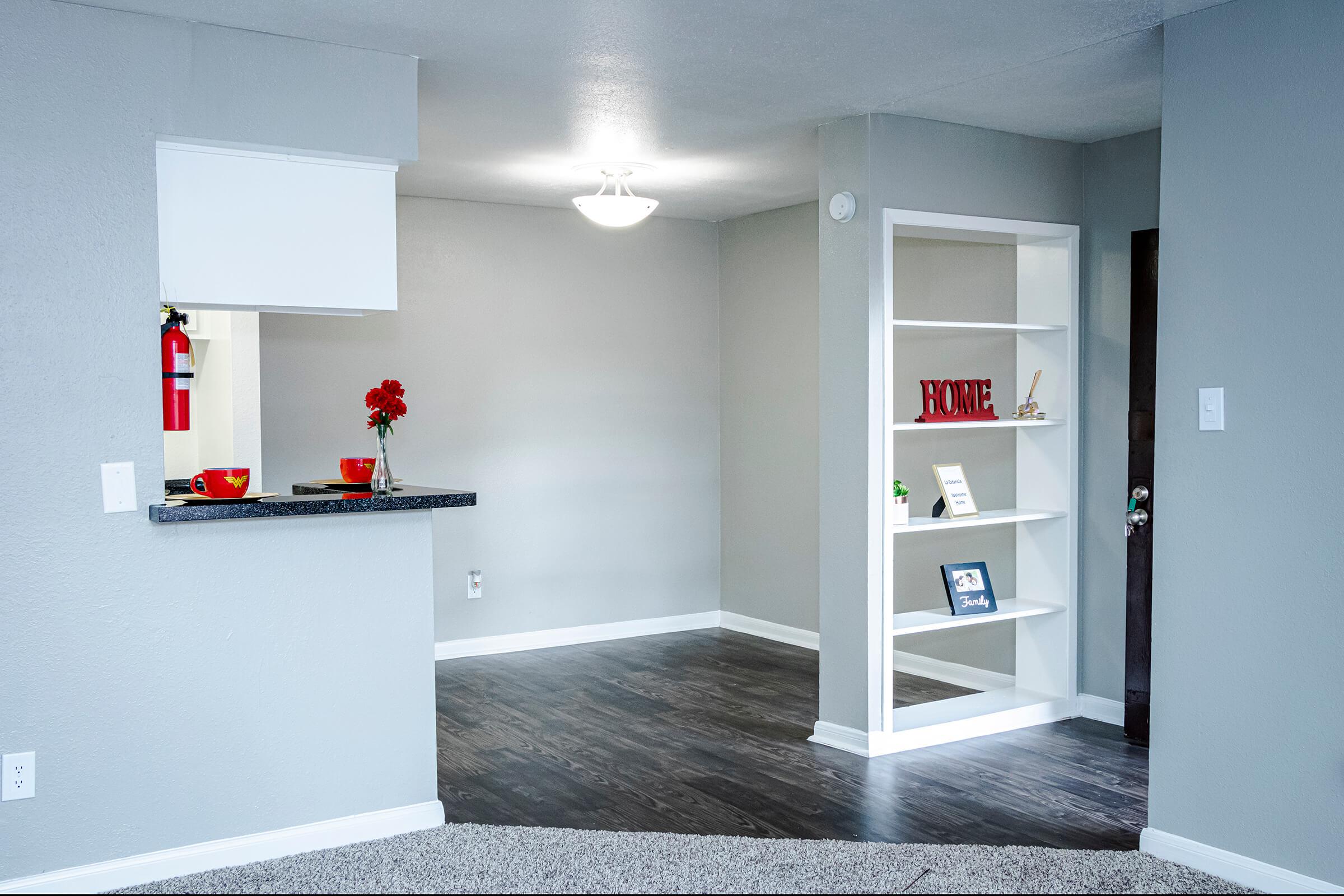 a white refrigerator freezer sitting in a room