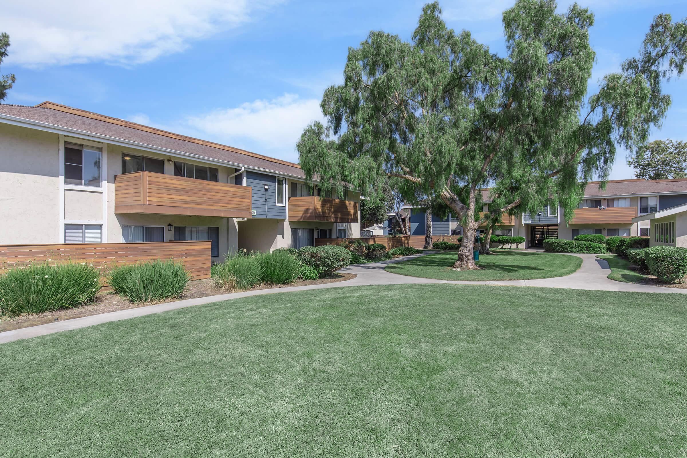 a large lawn in front of a house