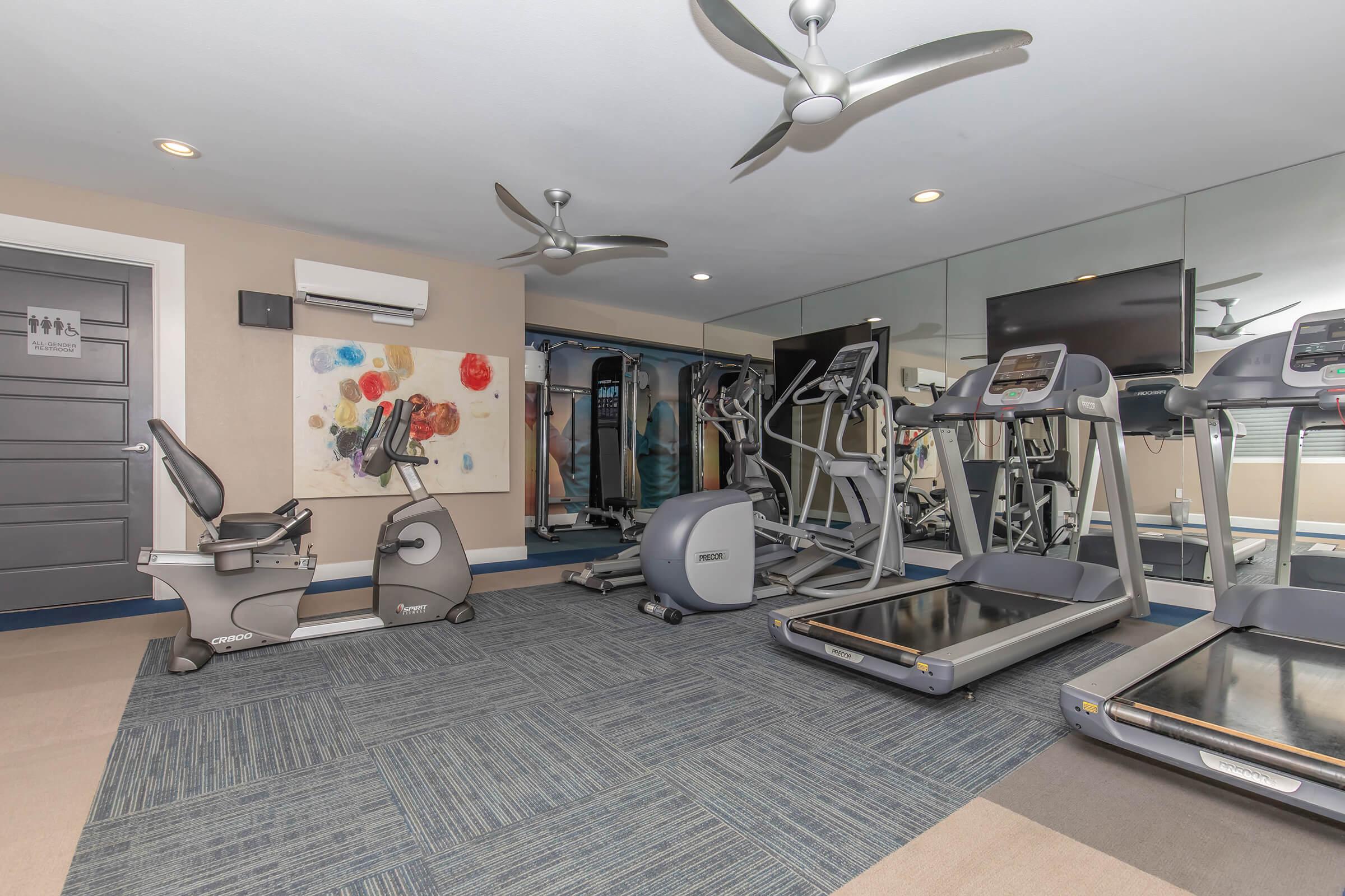 One-Bedroom Apartments In Oceanside, CA - The Dylan - State-of-the-art Fitness Center Equipped With Cardio & Weight-Lifting Machines, TVs, Full-Body Mirrors, And Ceiling Fans