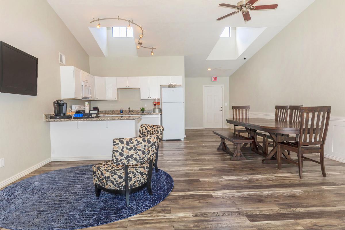 a room filled with furniture and a table