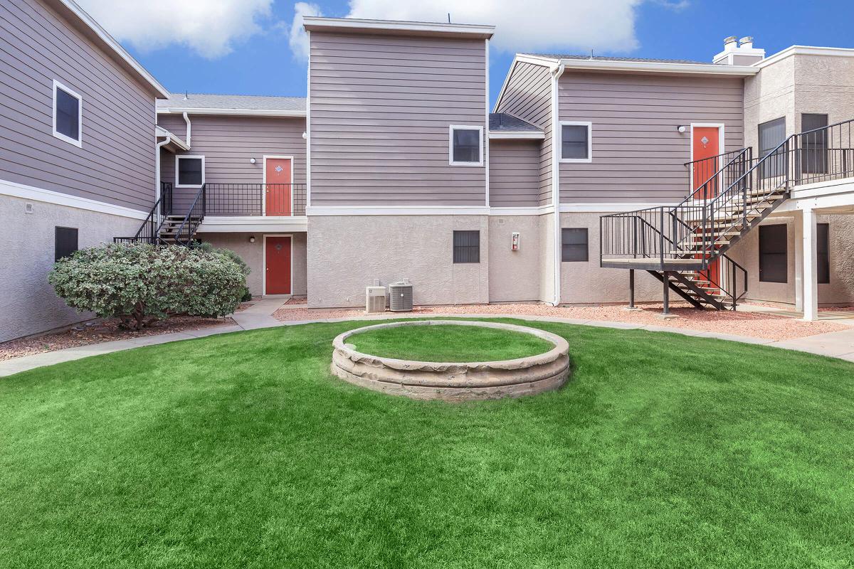 a large lawn in front of a house