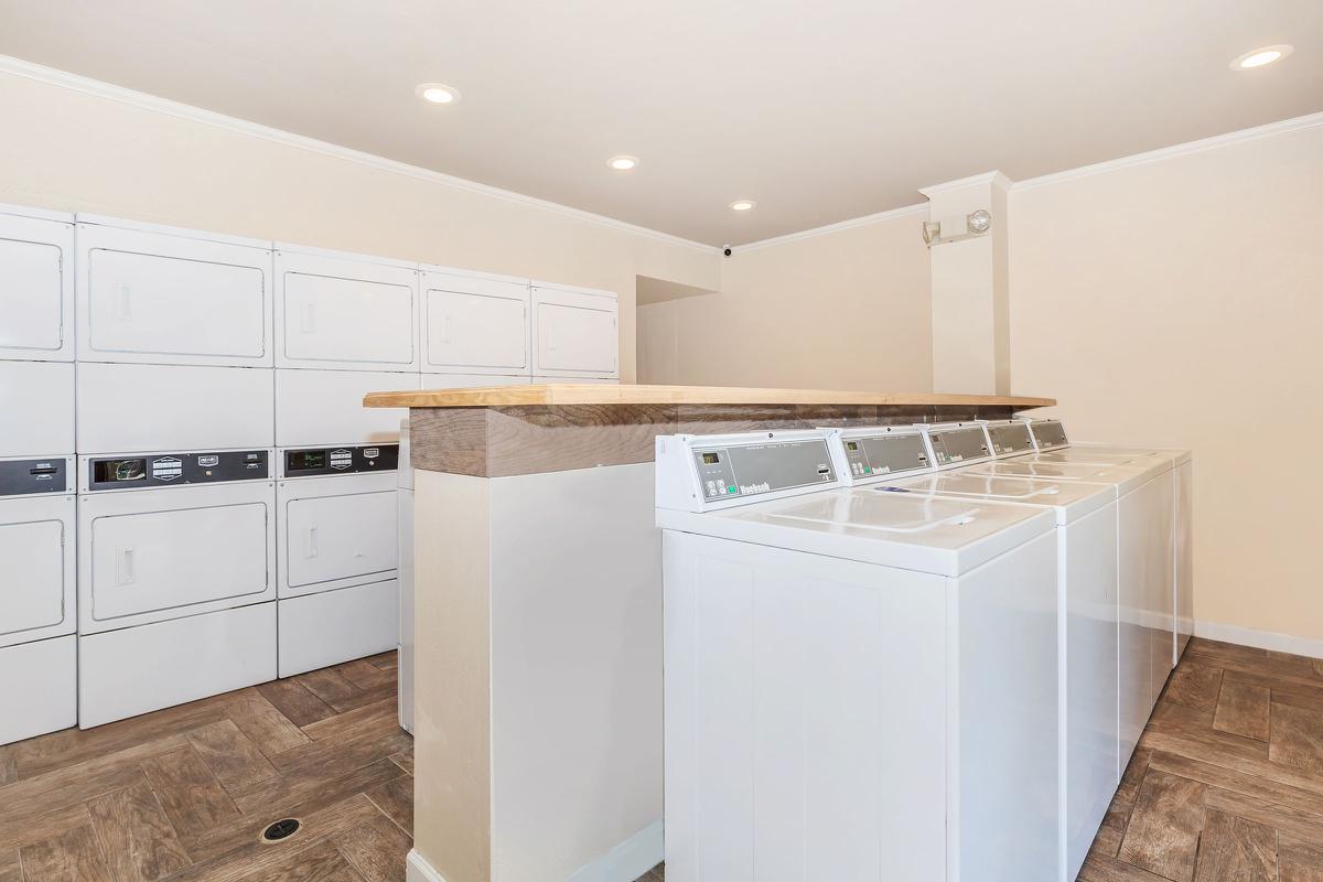 a large white refrigerator in a kitchen