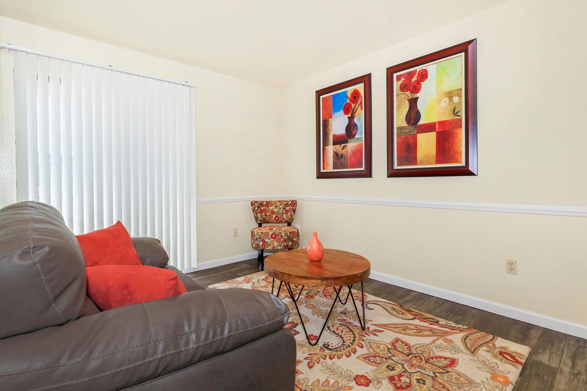 a red leather couch in a living room