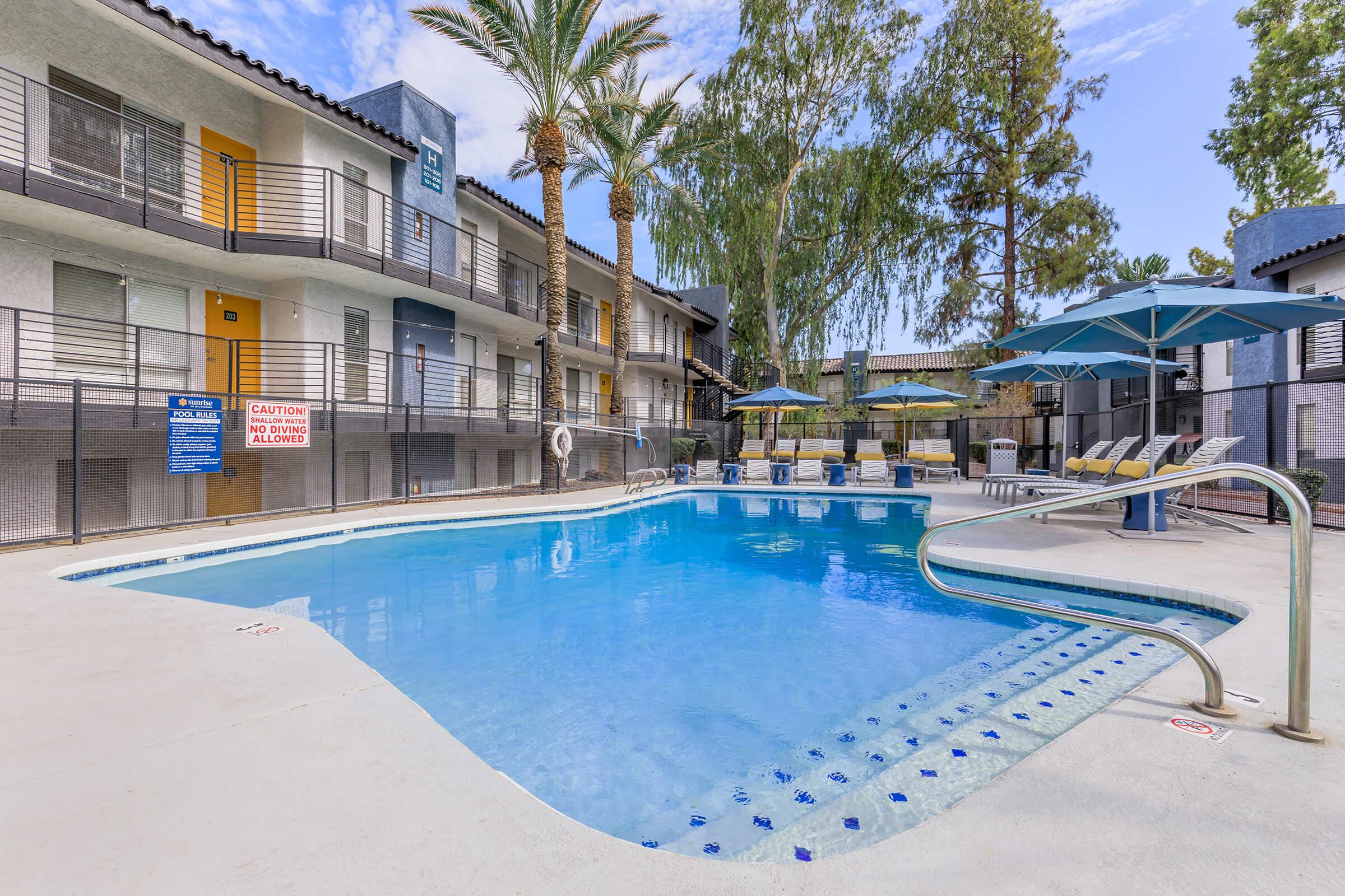 a pool next to a building