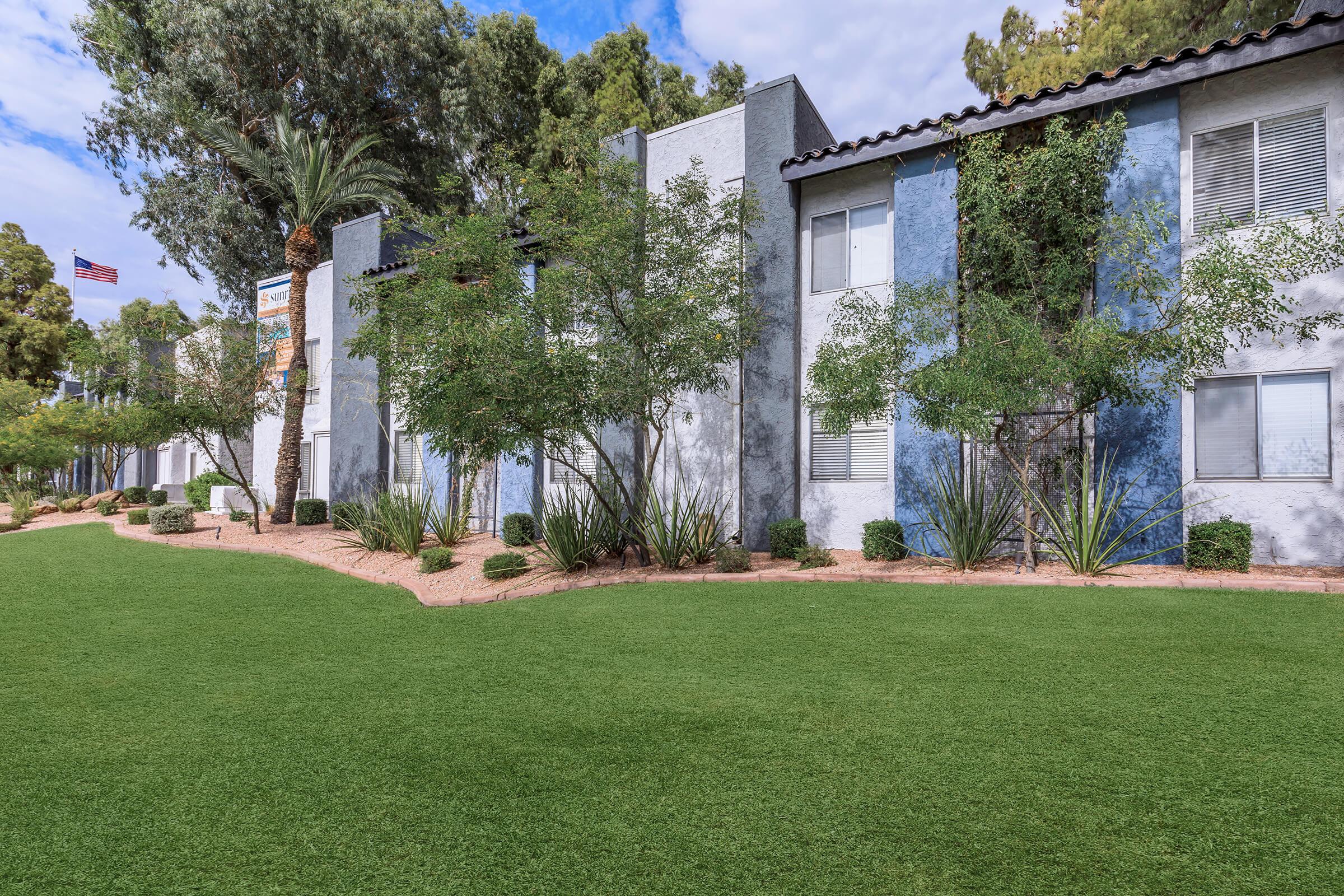 a large lawn in front of a house