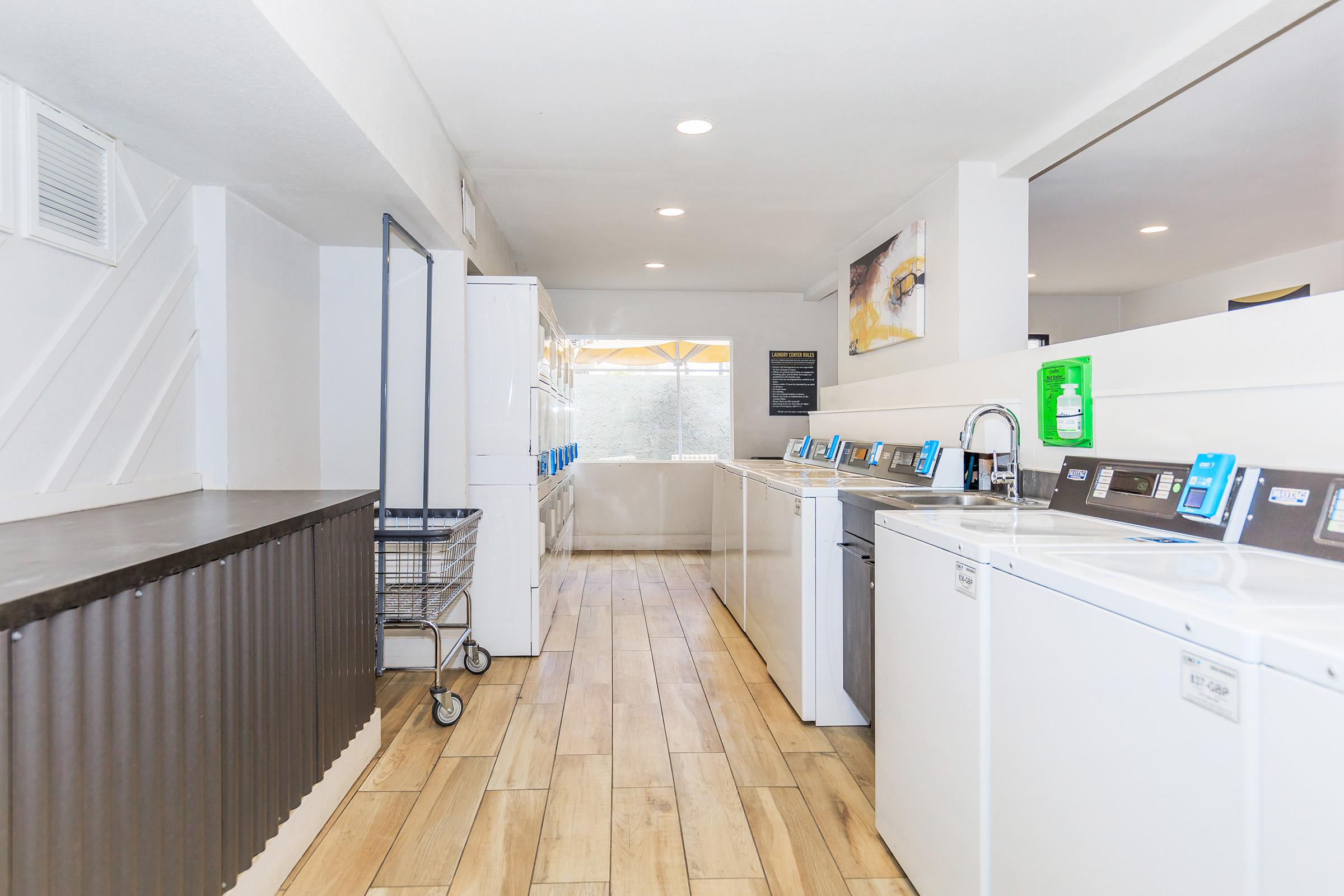 a kitchen with a stove and a refrigerator