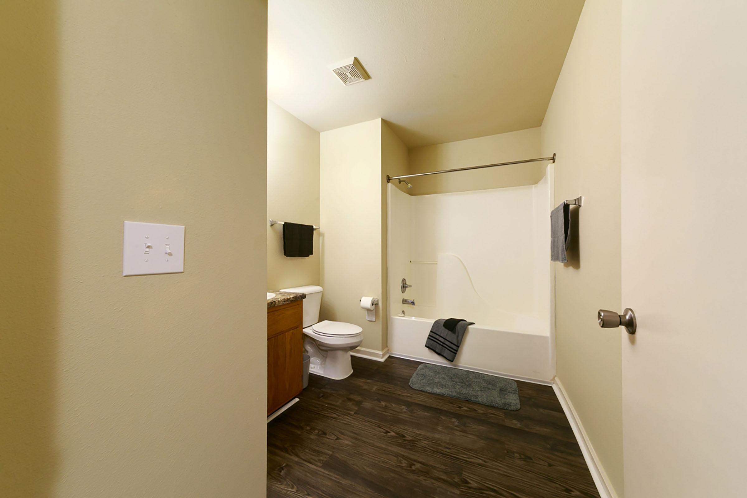 a room with a sink and a mirror