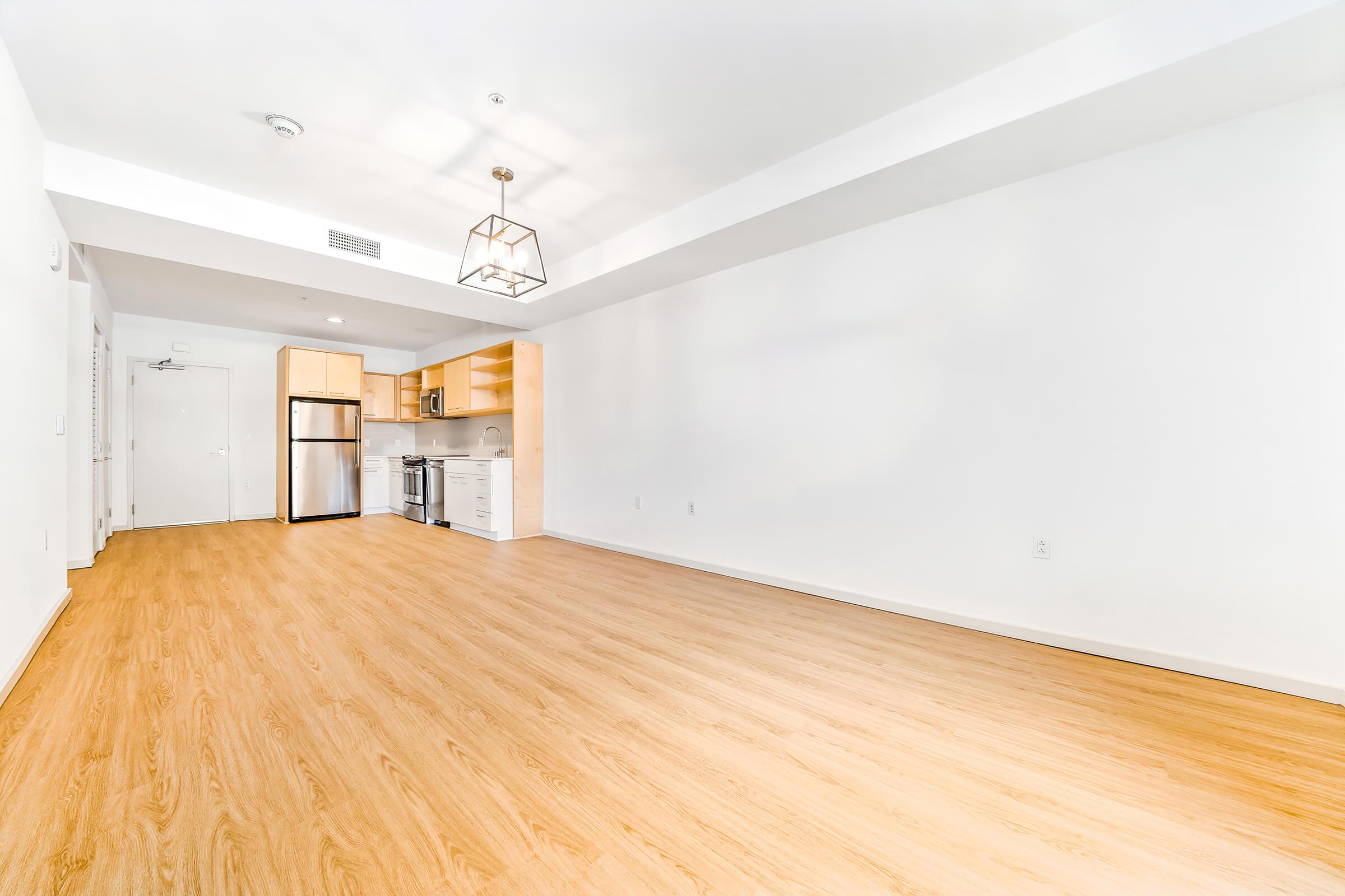 vacant apartment with wooden floors