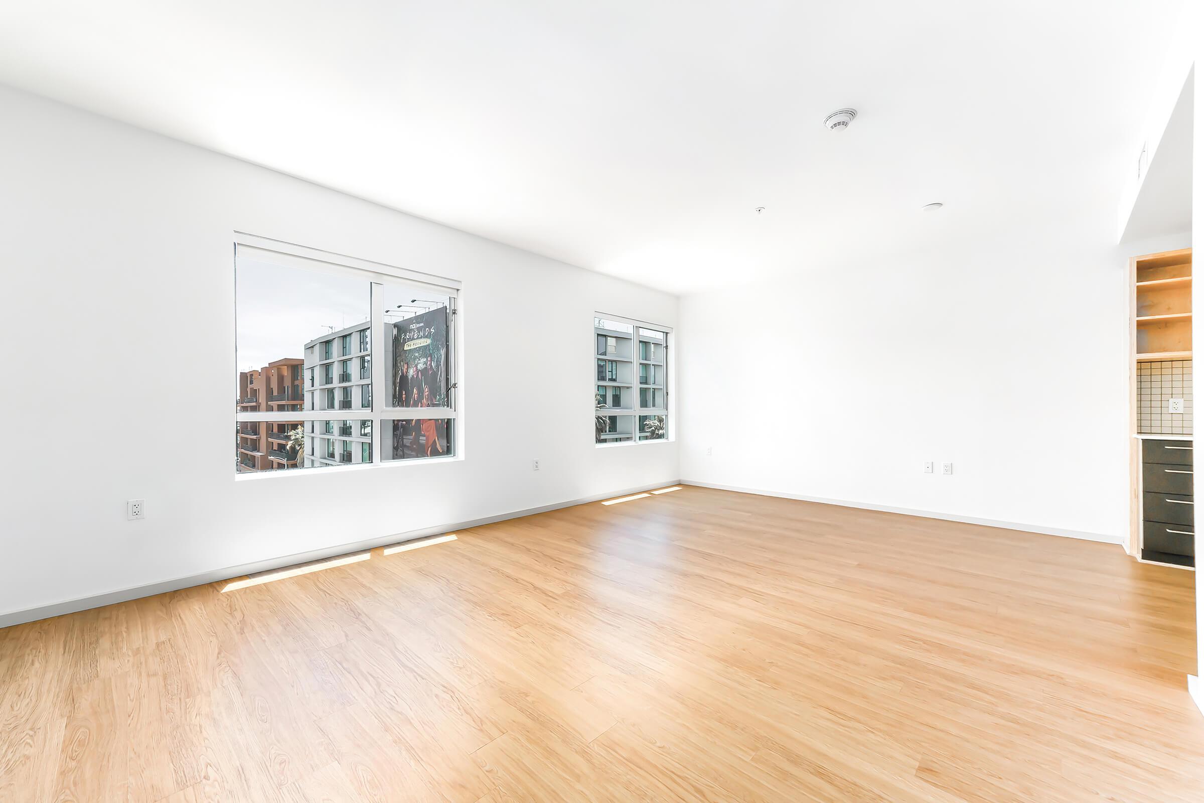 unfurnished apartment with windows