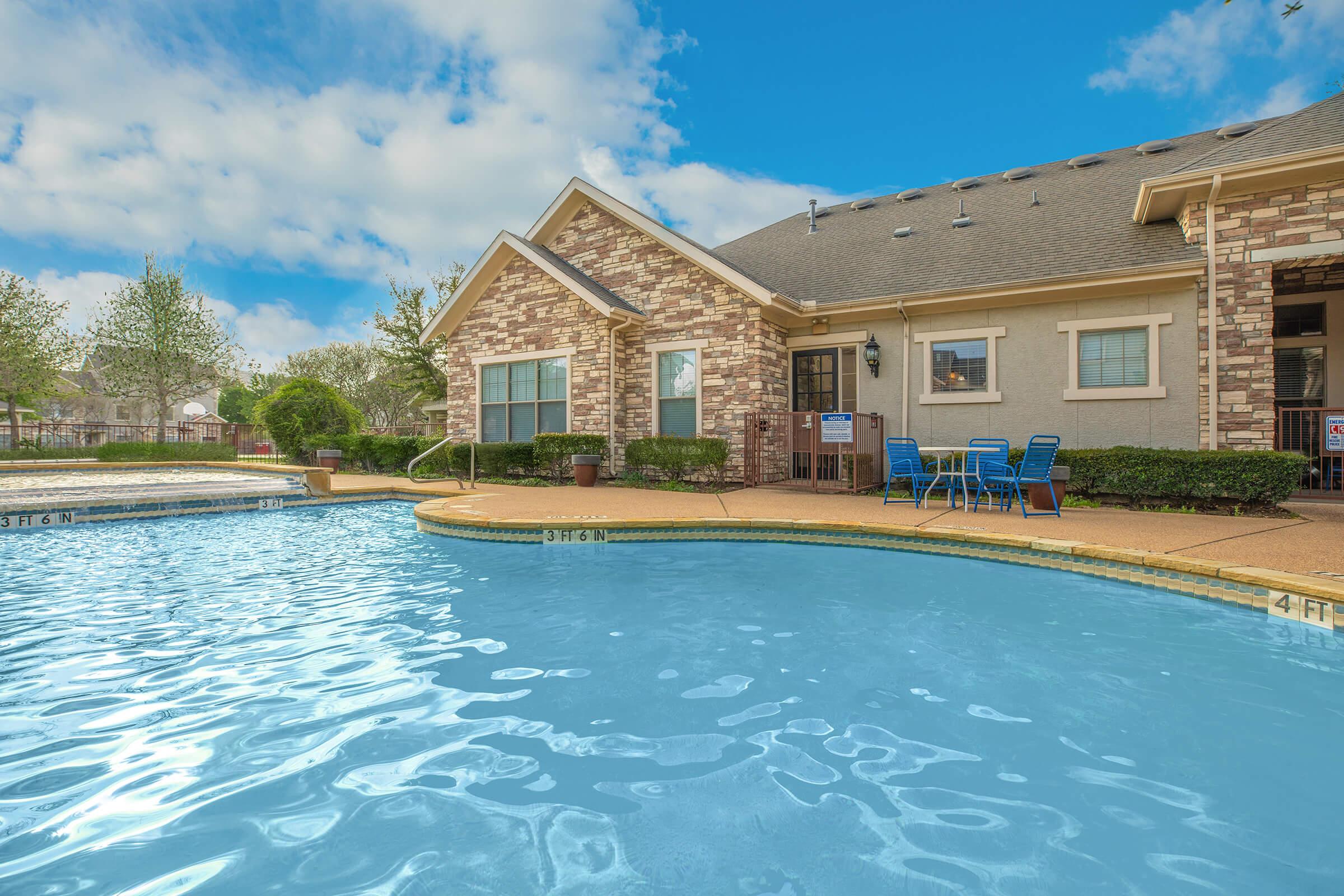 a small house in a pool of water