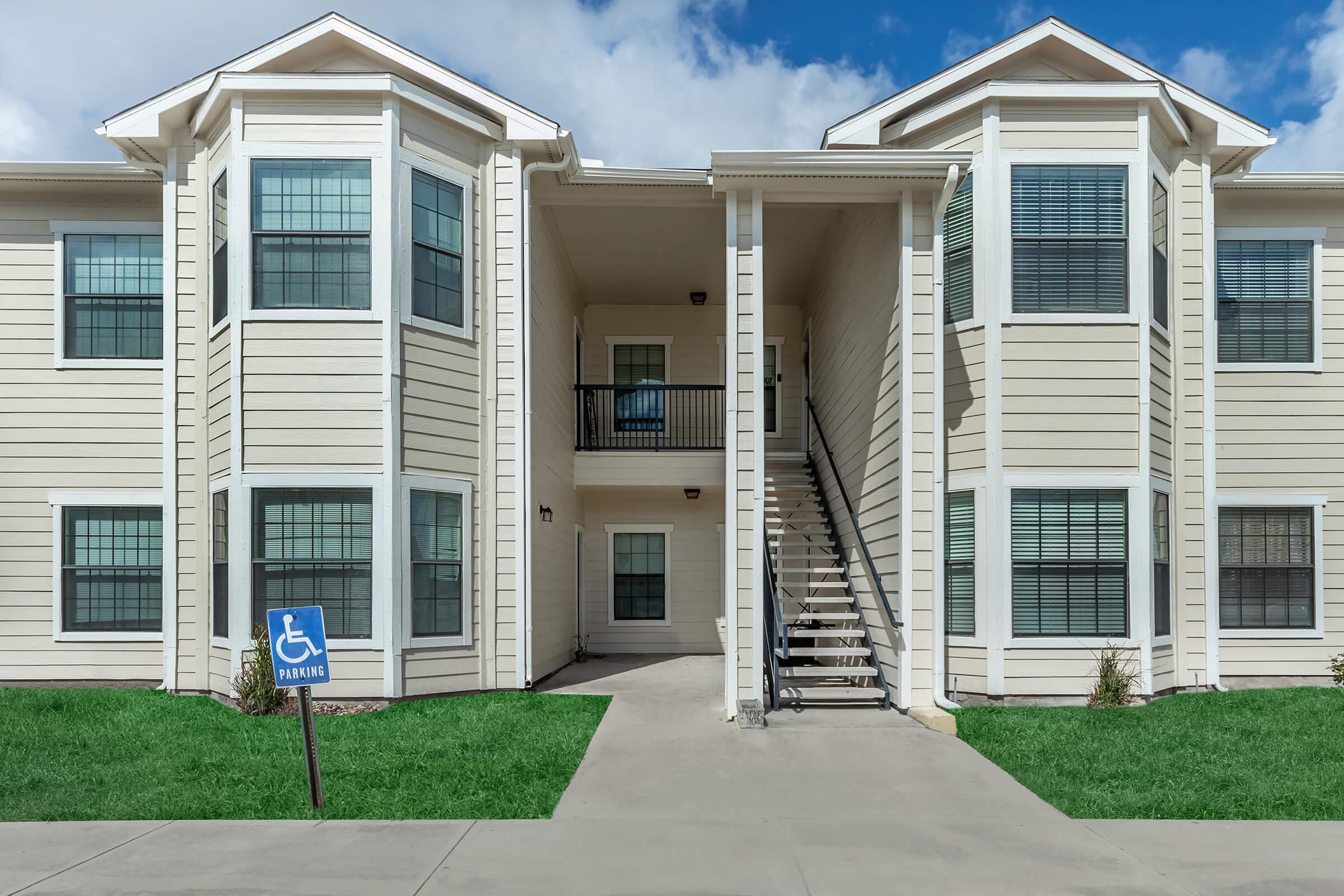 a large lawn in front of a house