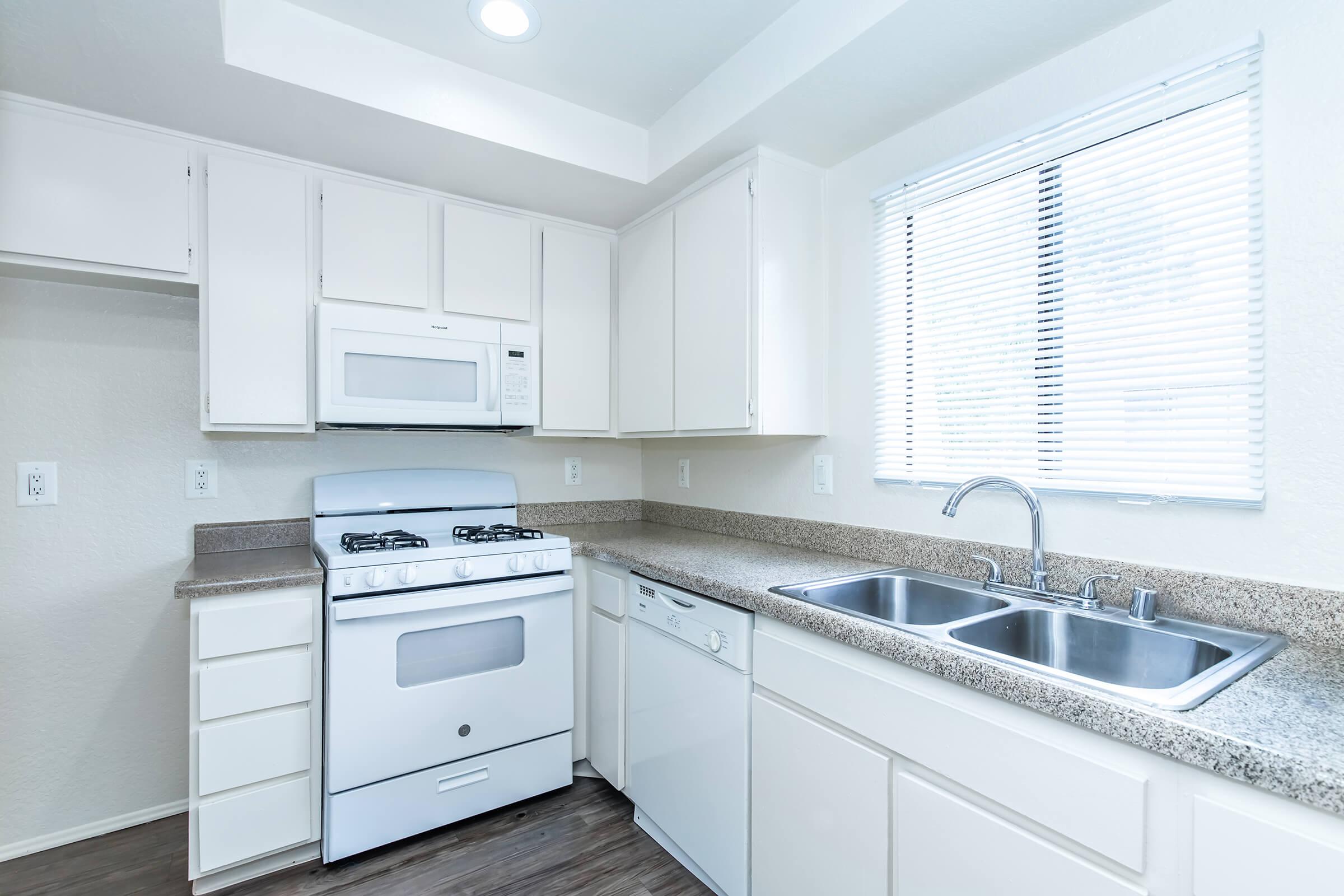 kitchen with white cabinets