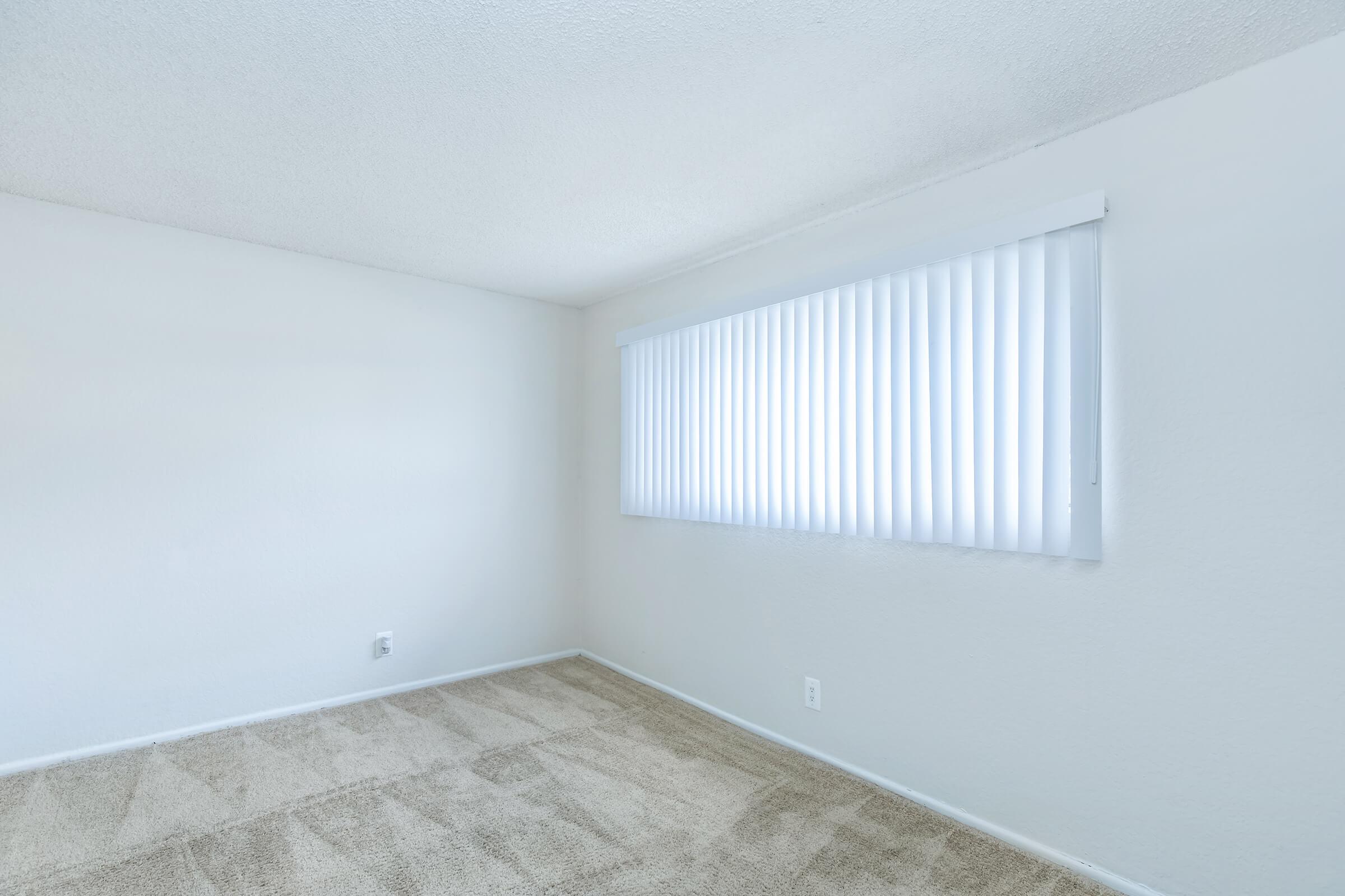 carpeted bedroom