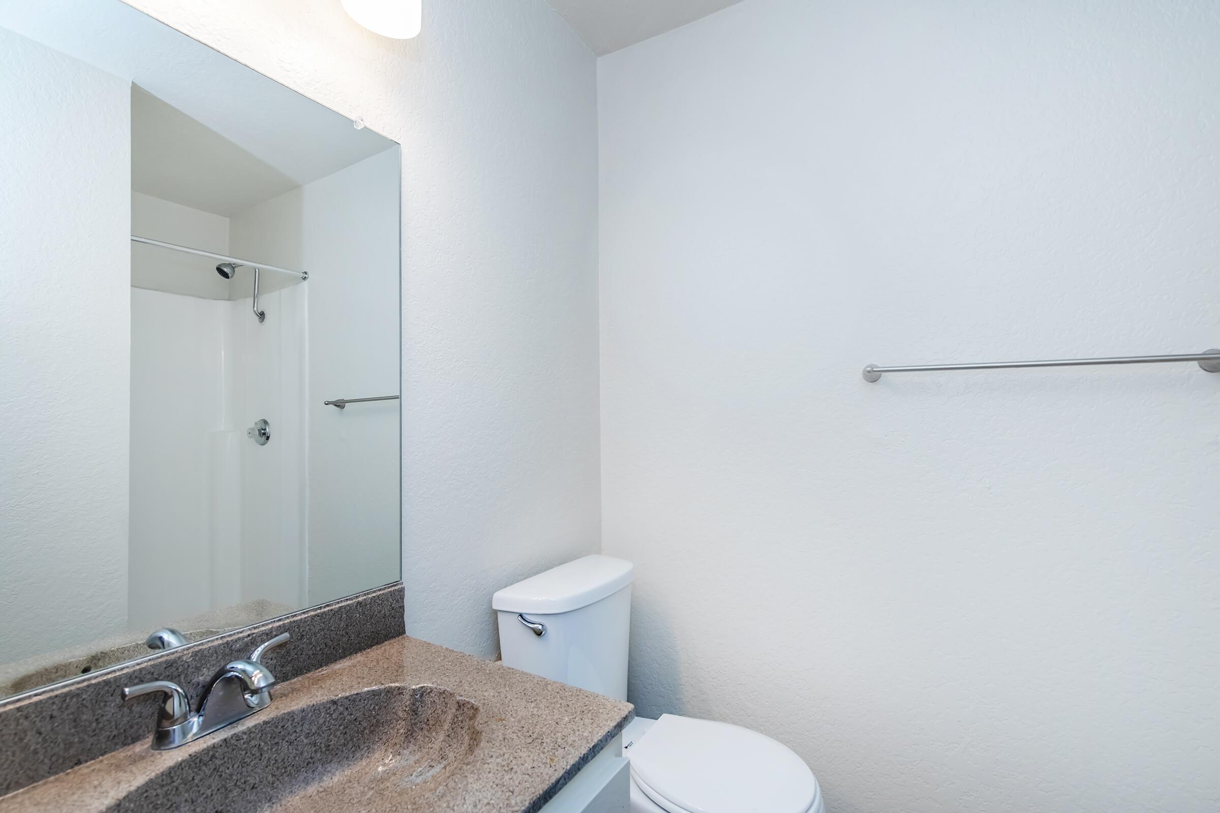 bathroom with a brown countertop