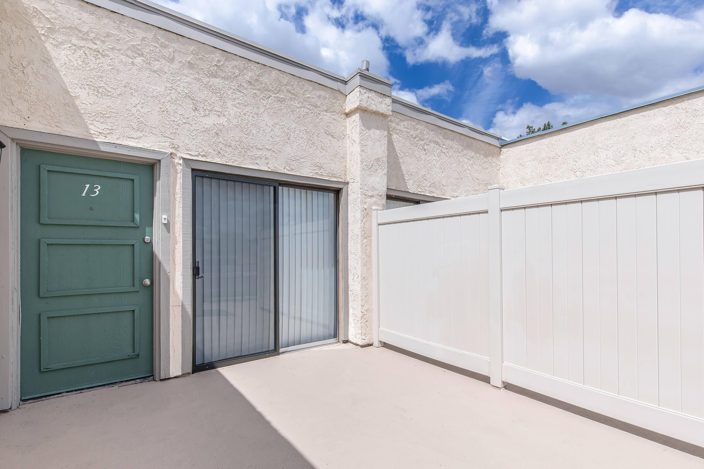 patio with wooden fencing