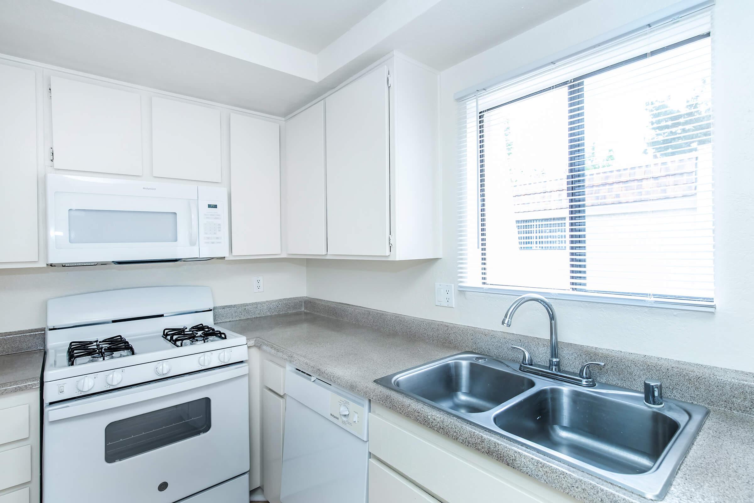 kitchen with grey countertops