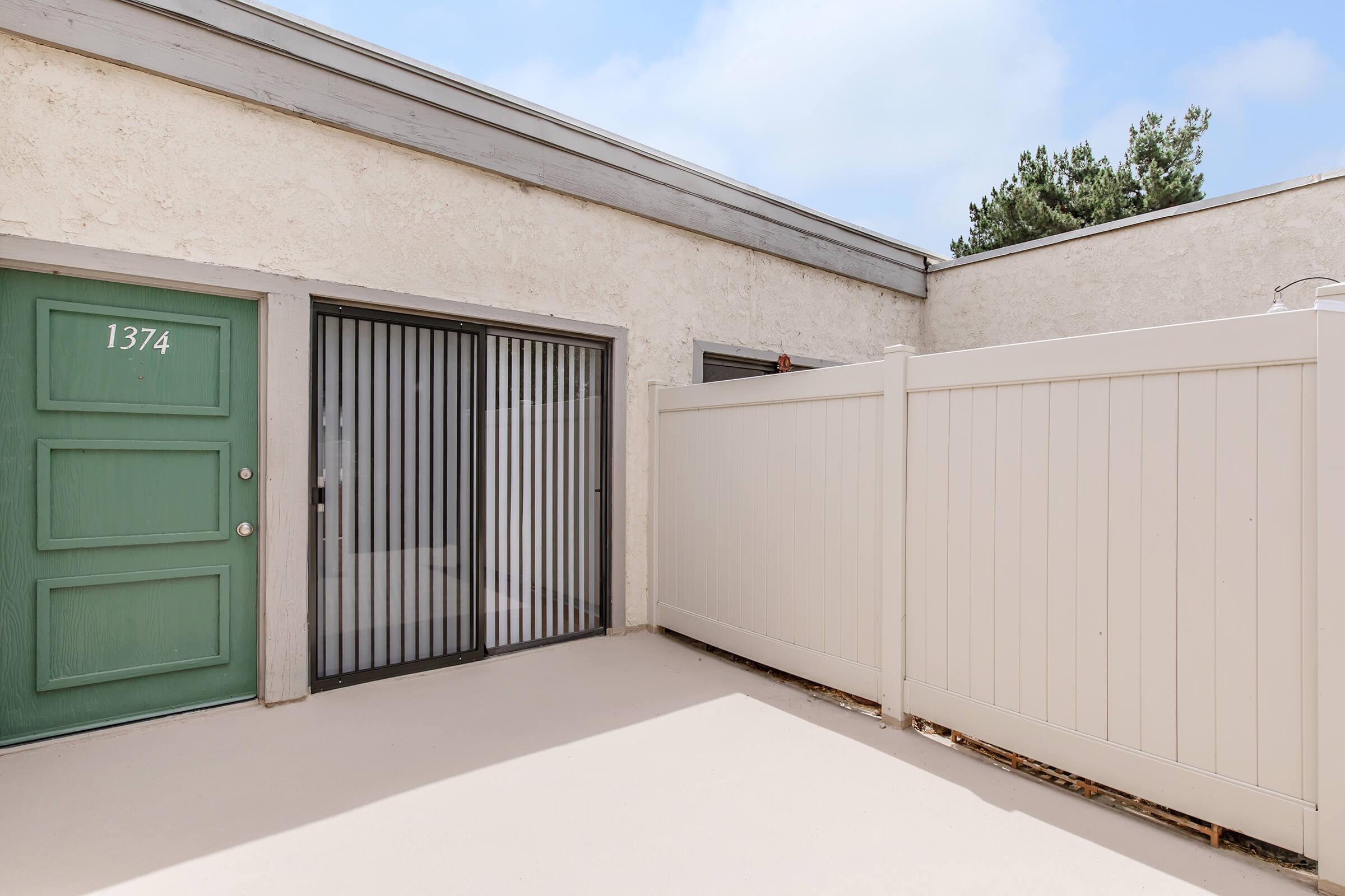 patio with a green door