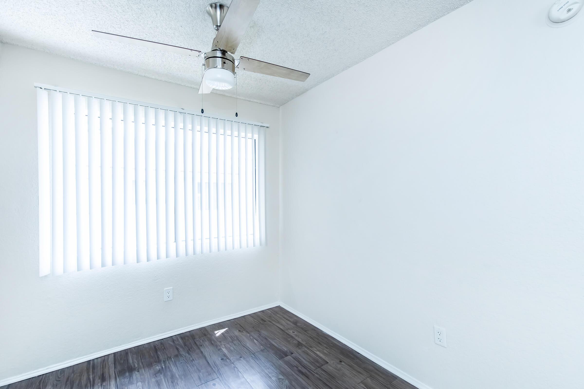 unfurnished dining room with wooden floors