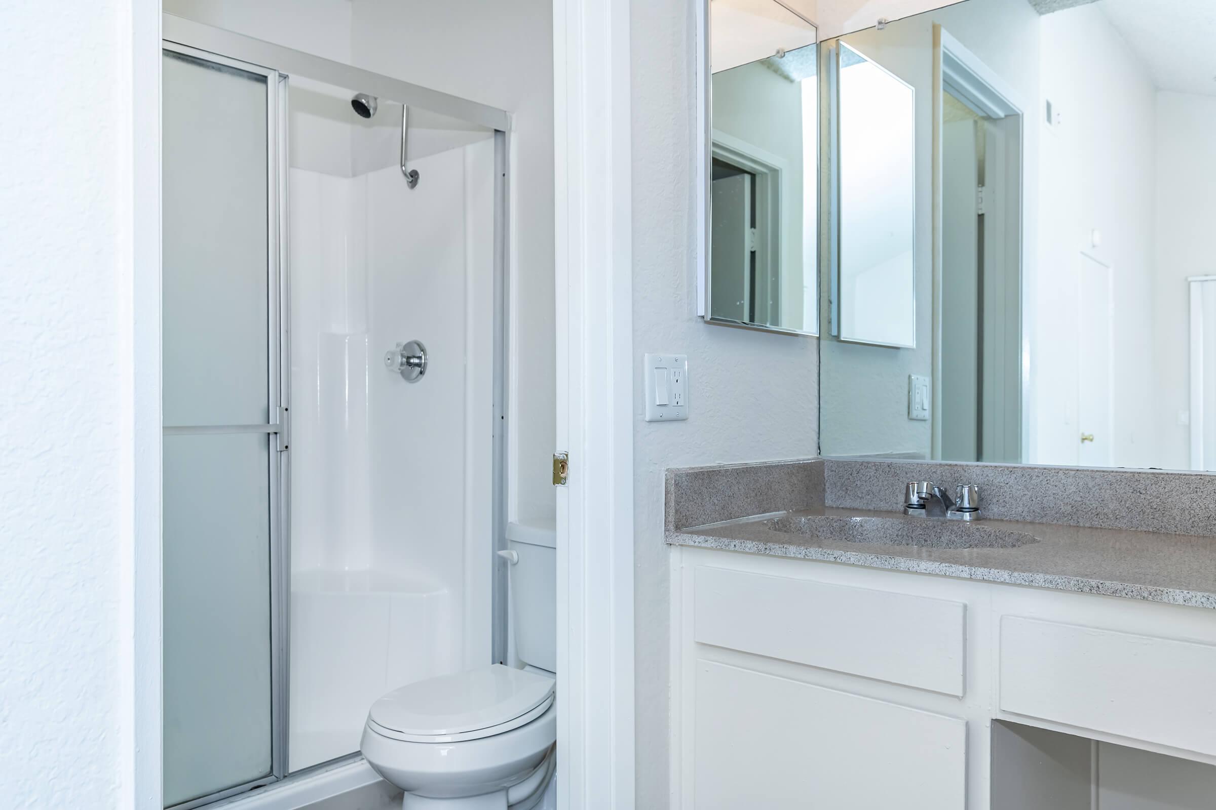 bathroom with glass shower doors