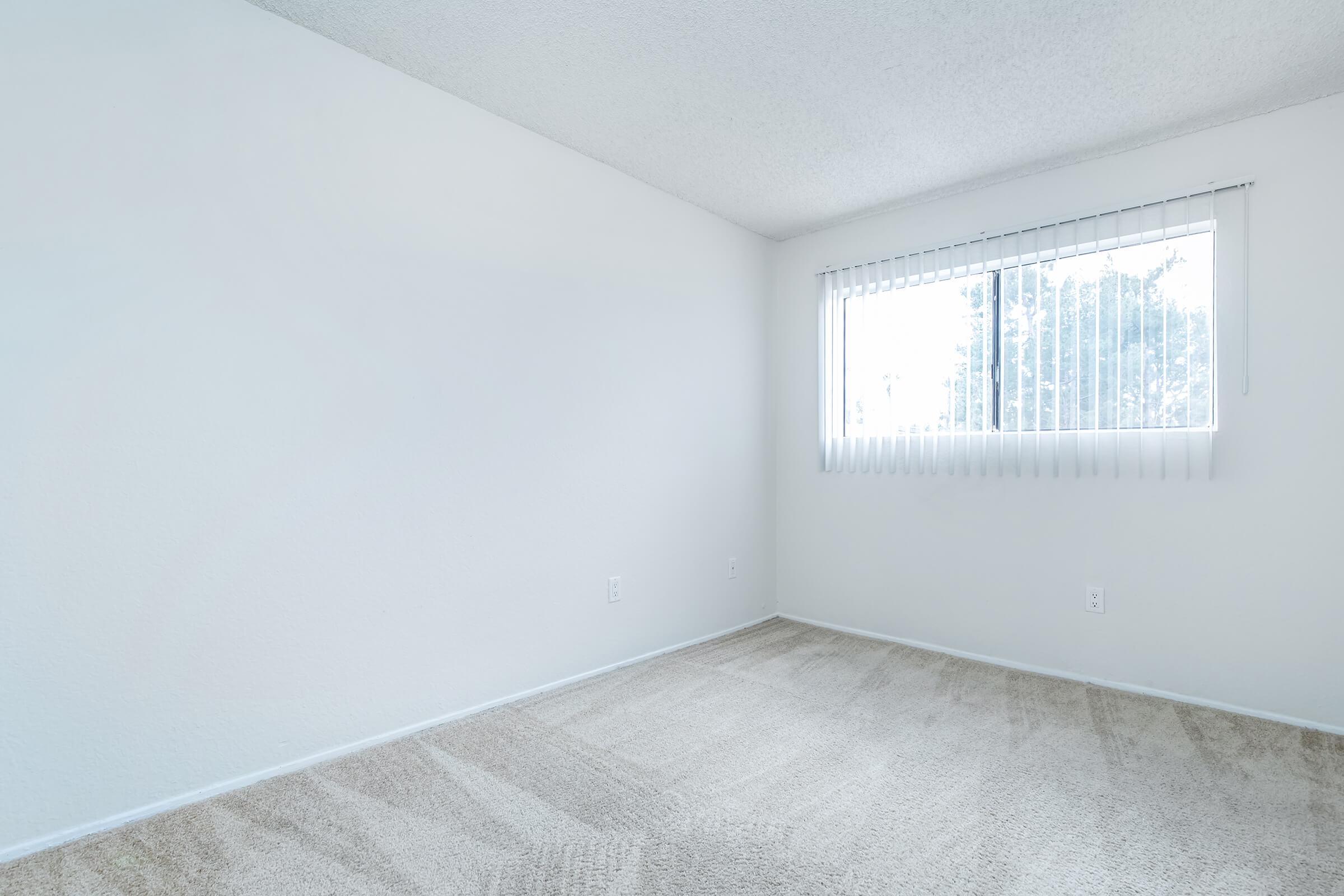 unfurnished bedroom with carpet