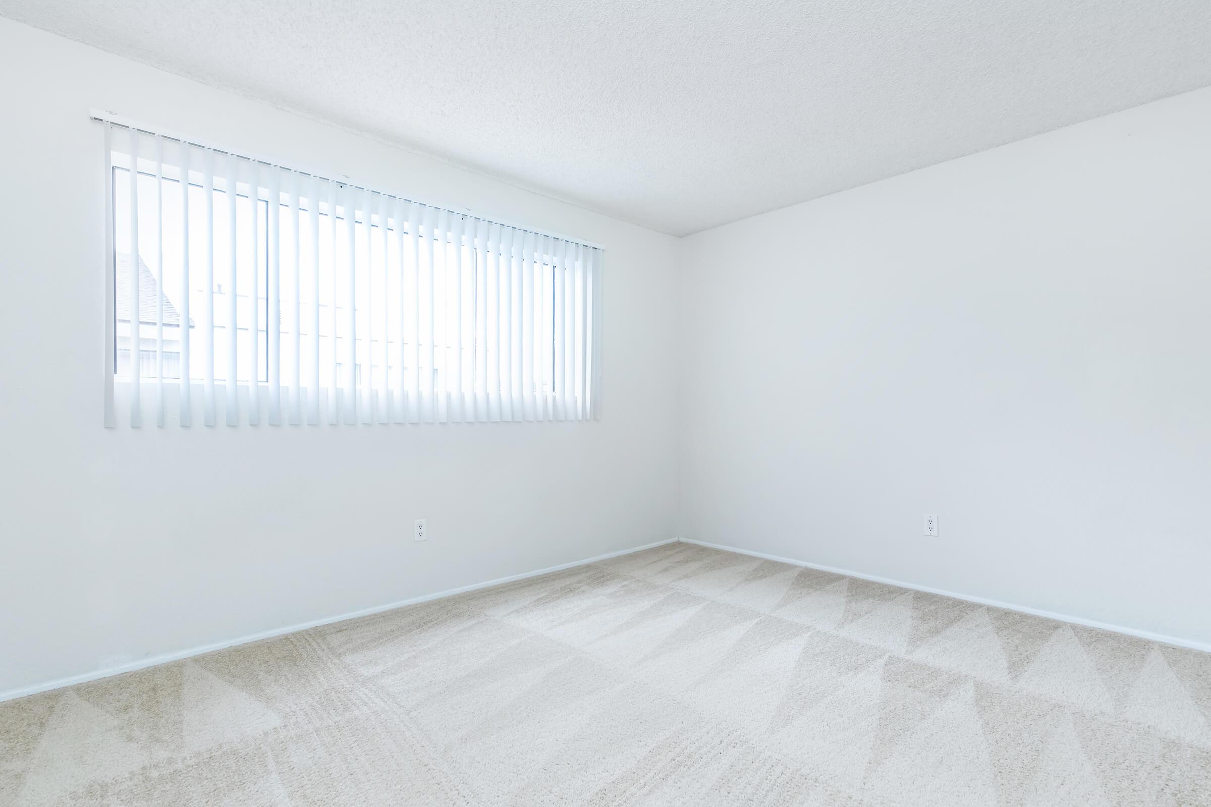 unfurnished carpeted bedroom