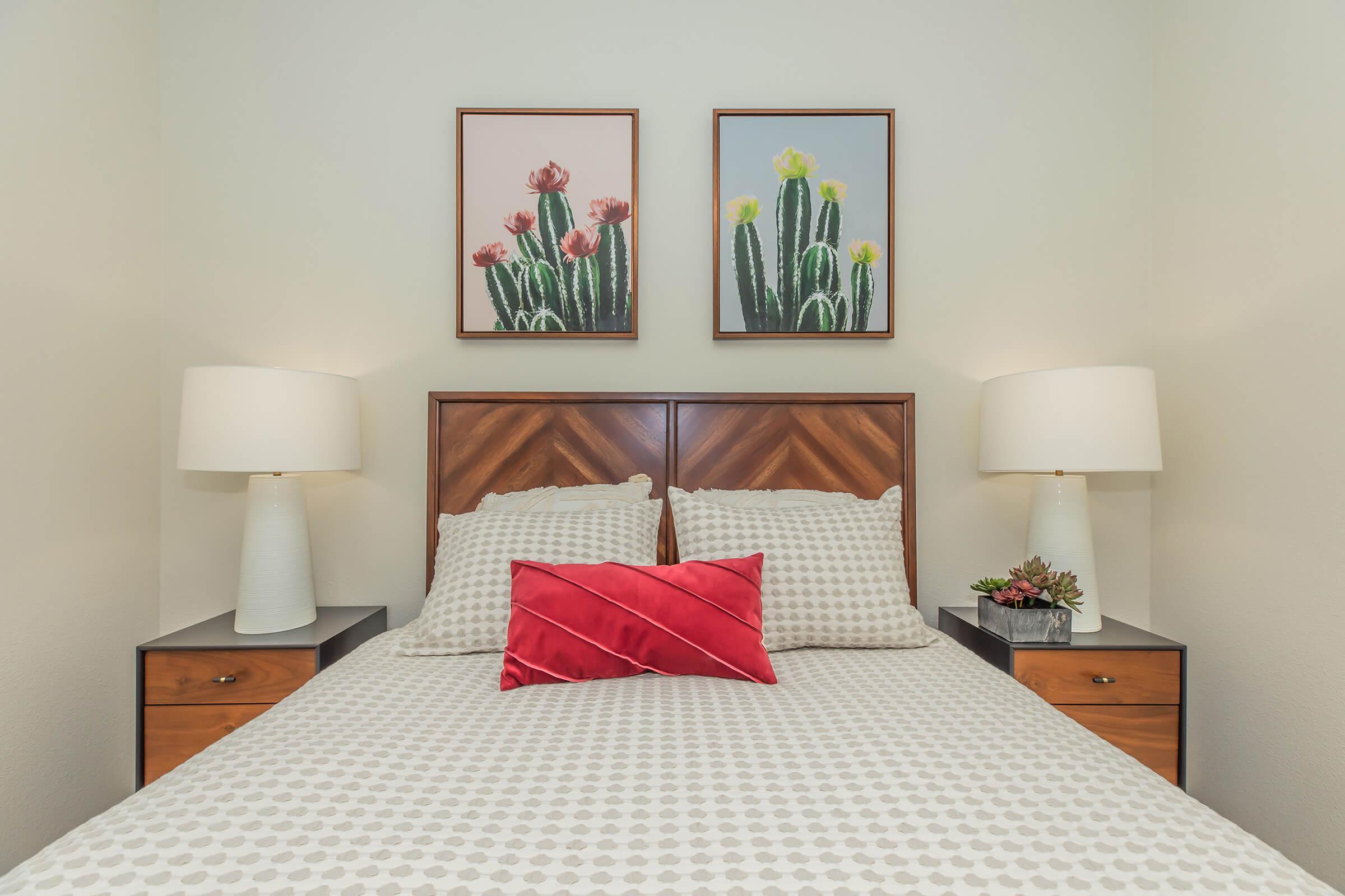 a bedroom with a large bed in a room