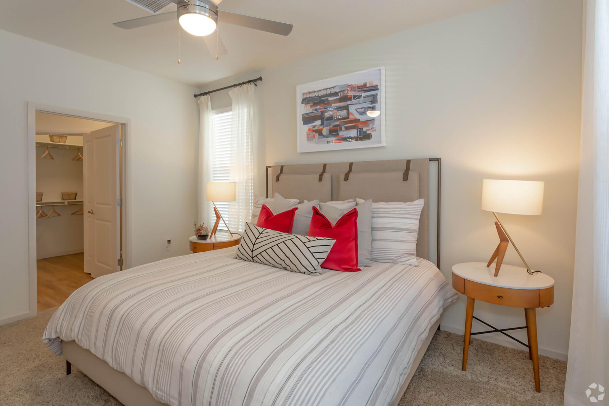 a bedroom with a bed in a hotel room