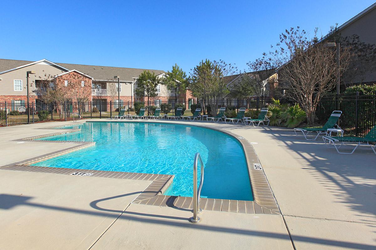 Relax Poolside At Our Community
