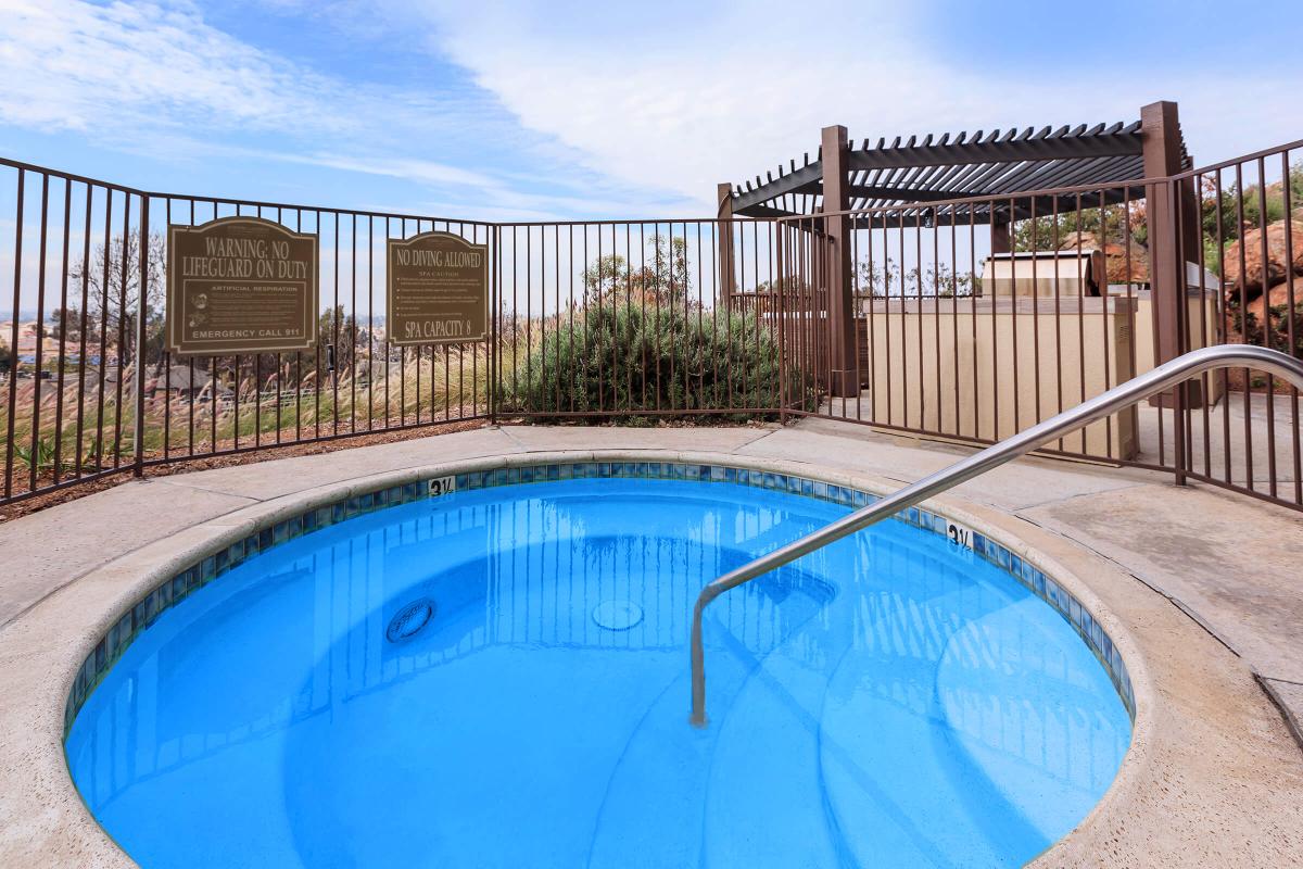 a pool next to a body of water