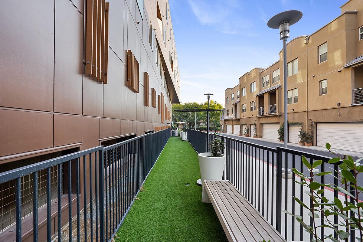 a building with a metal fence