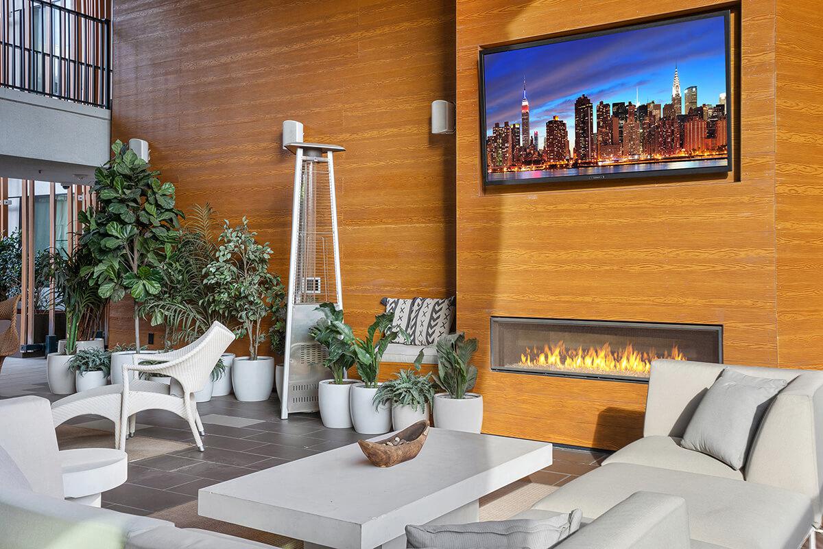 a living room filled with furniture and a fire place