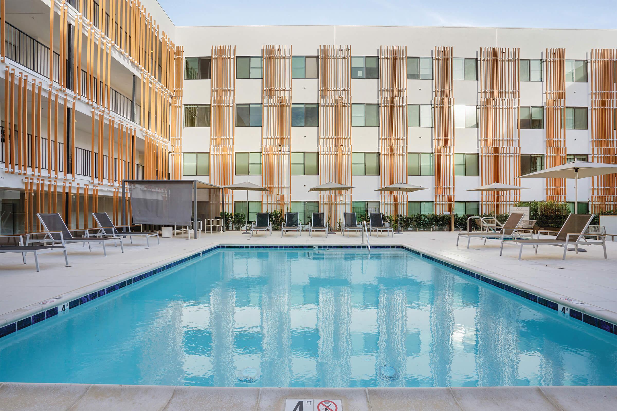 Prisma apartments features a resort themed pool for you to utilize