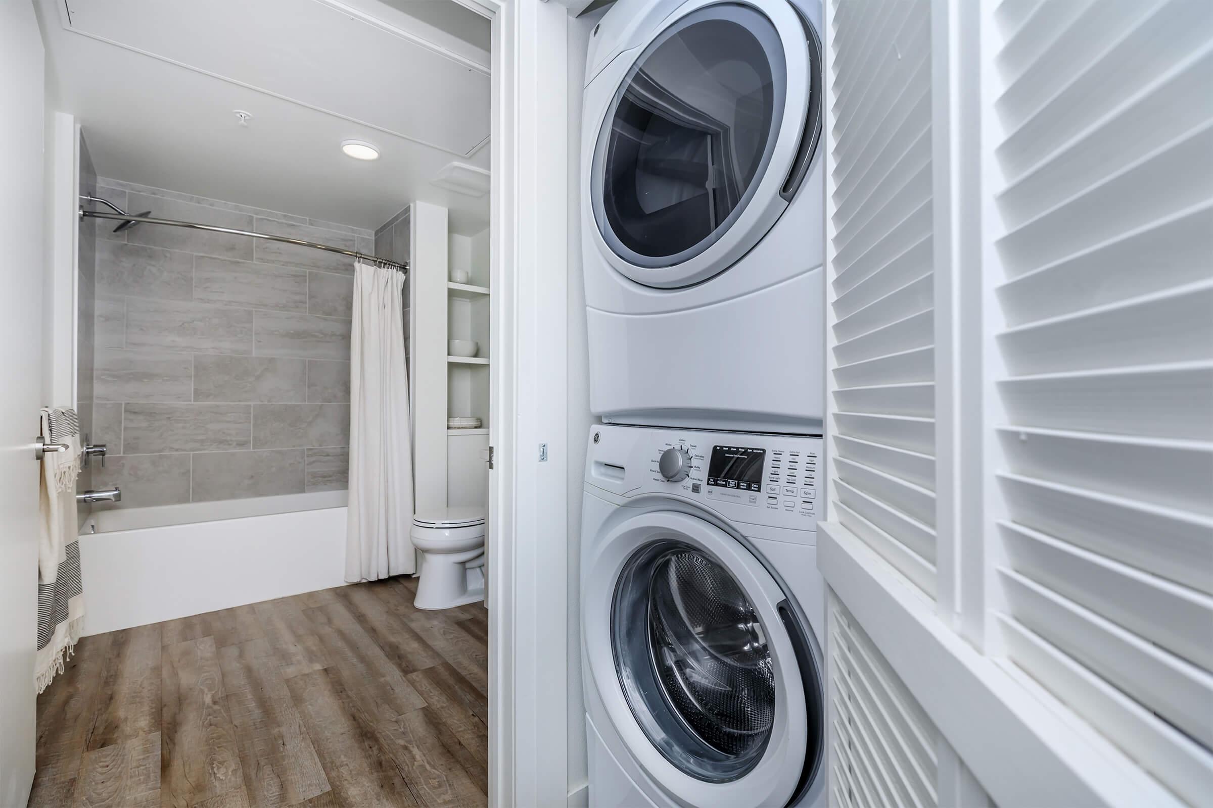 We offer a full-size stacked front loading washer and dryer