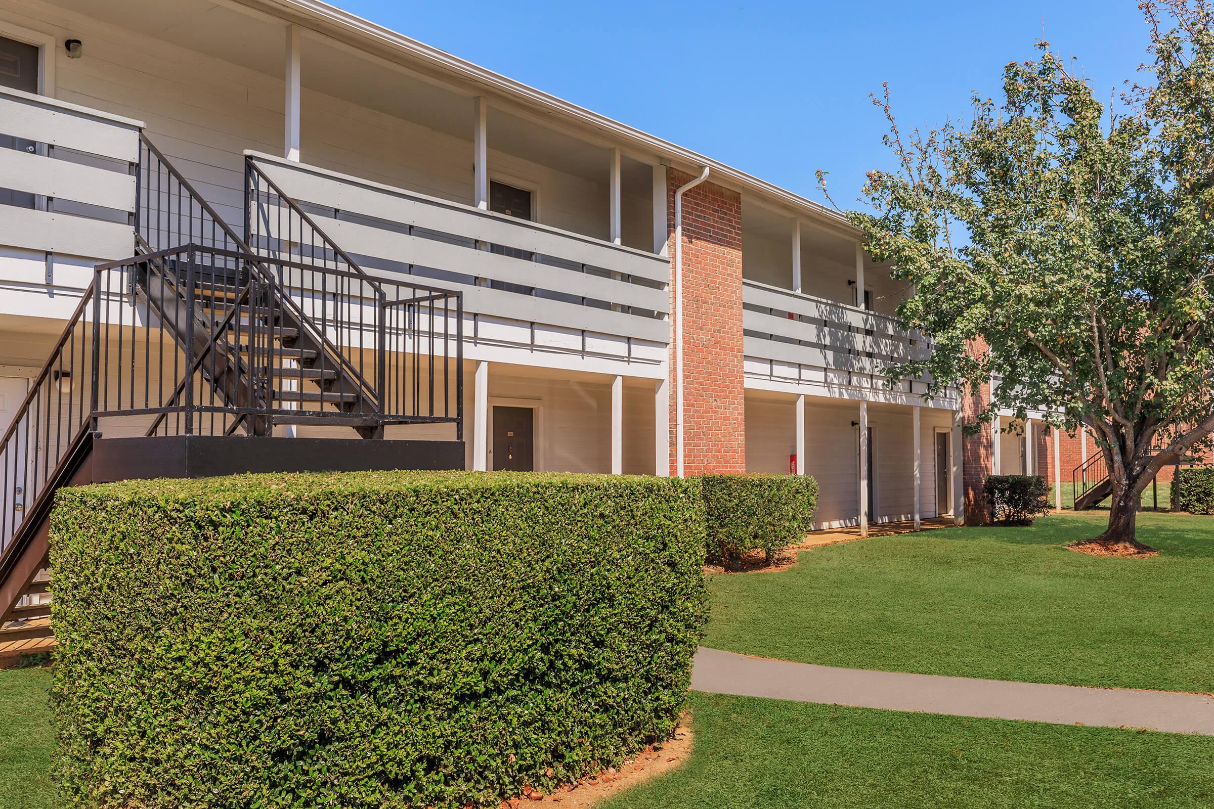 a large lawn in front of a building