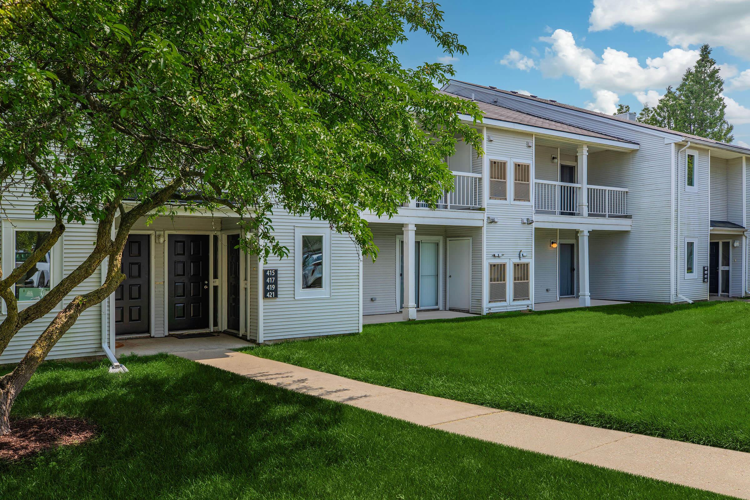 a large lawn in front of a house