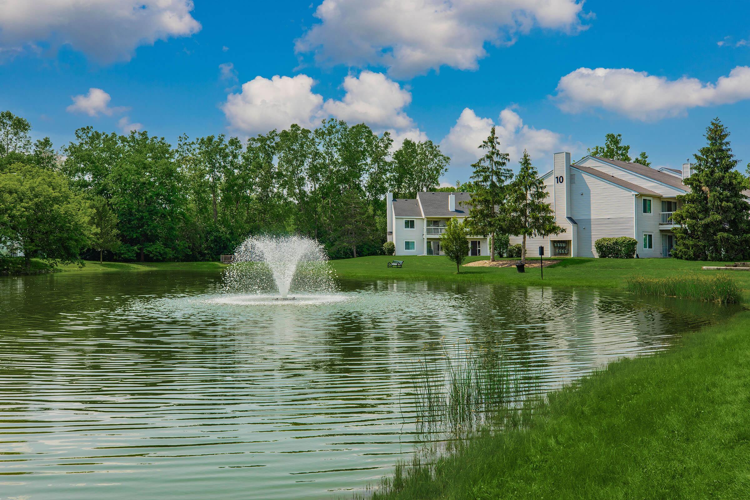 a small house surrounded by water