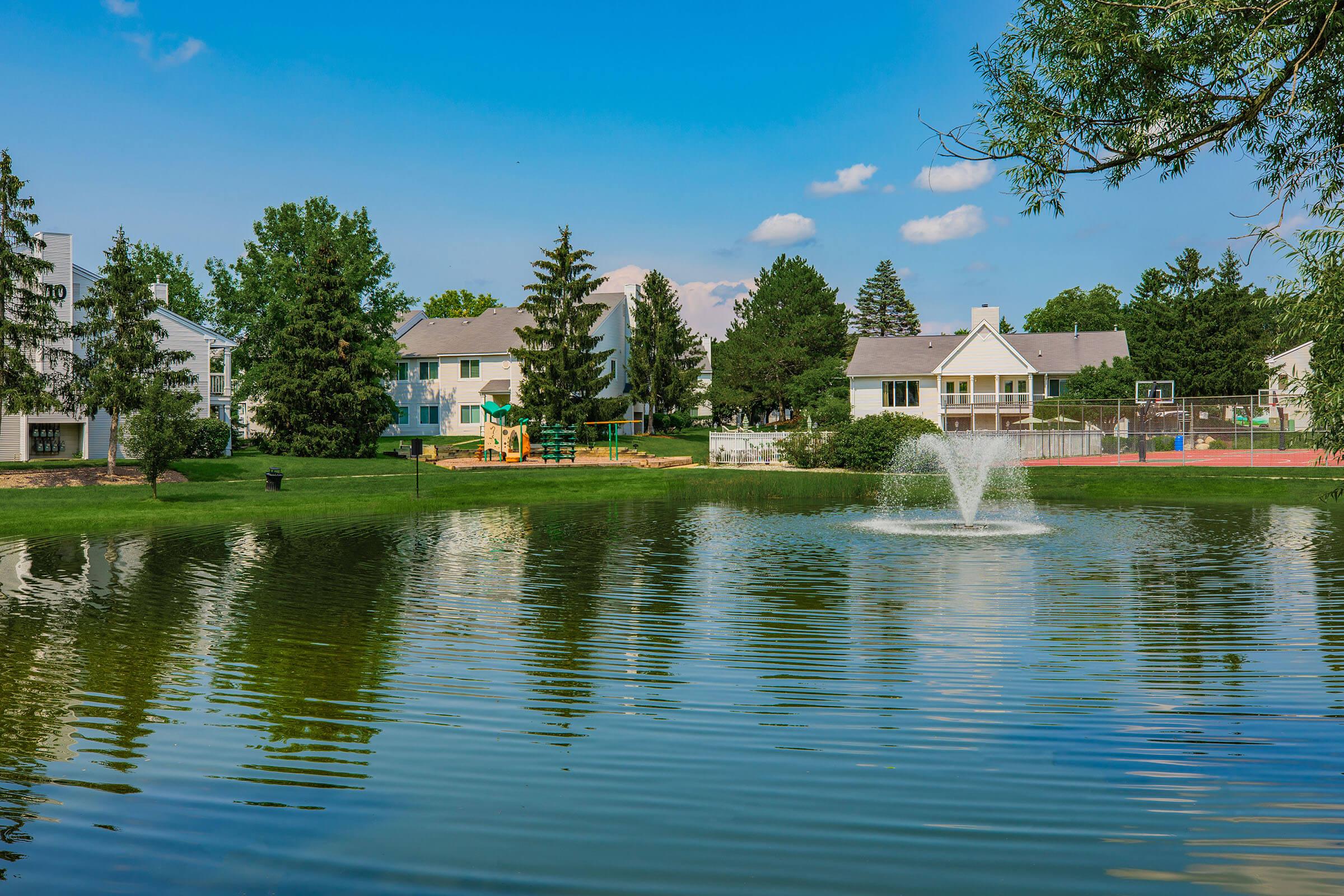 a small house surrounded by water