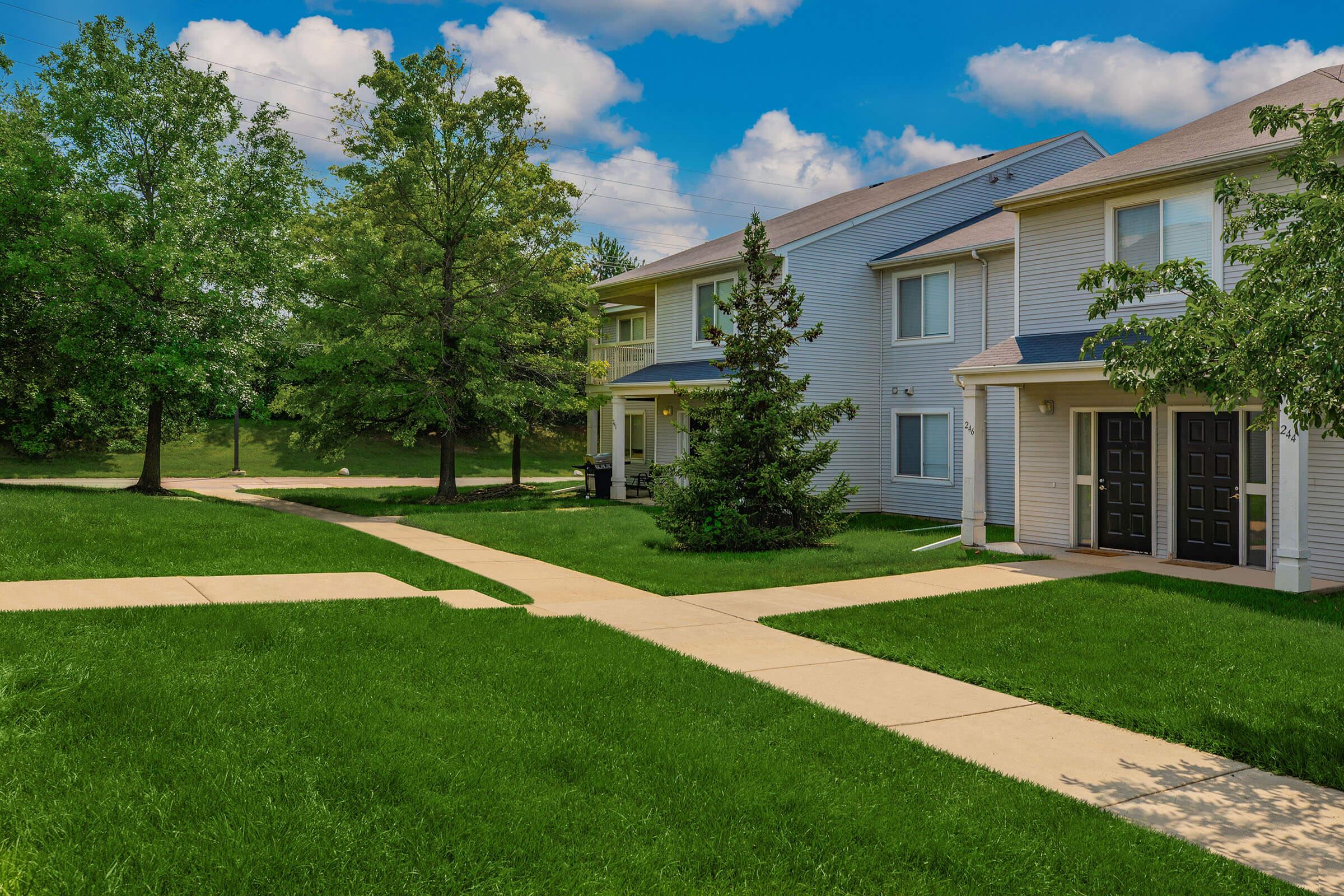 a large lawn in front of a house