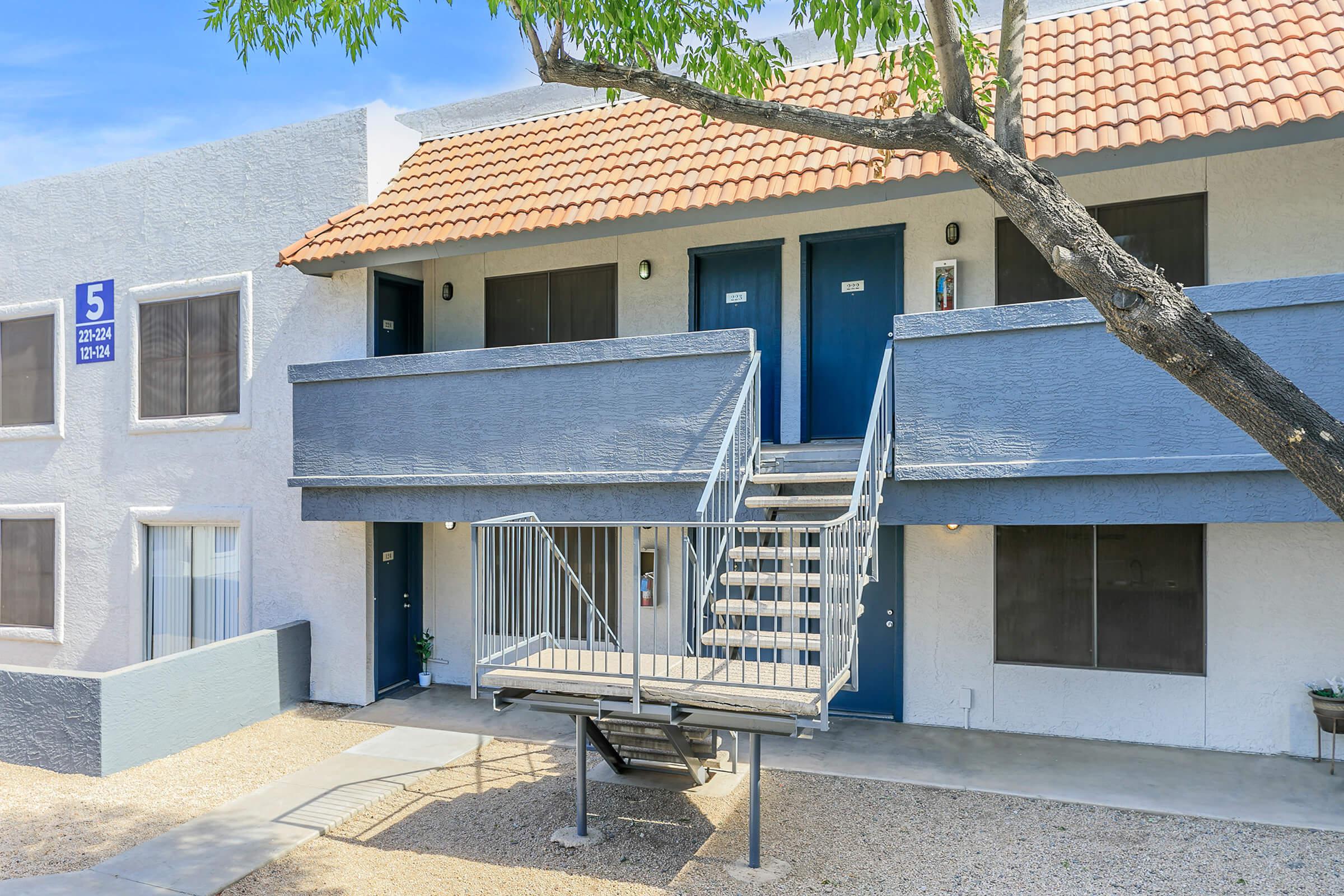 The exterior of the Rise Trailside apartment building with stairs.