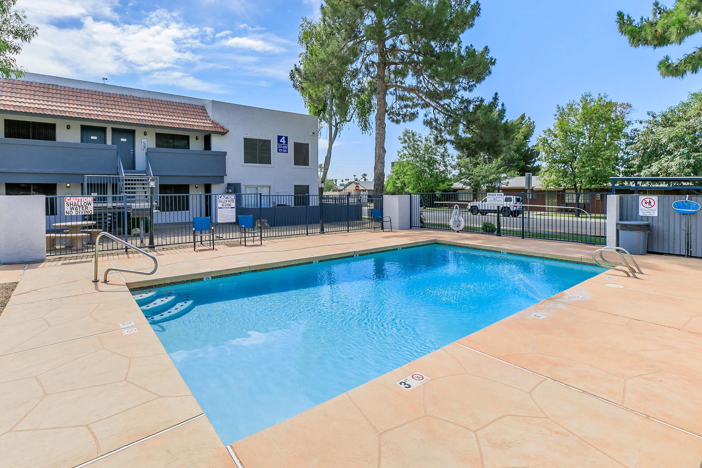 The pool area at Rise Trailside surrounded by the apartments. 