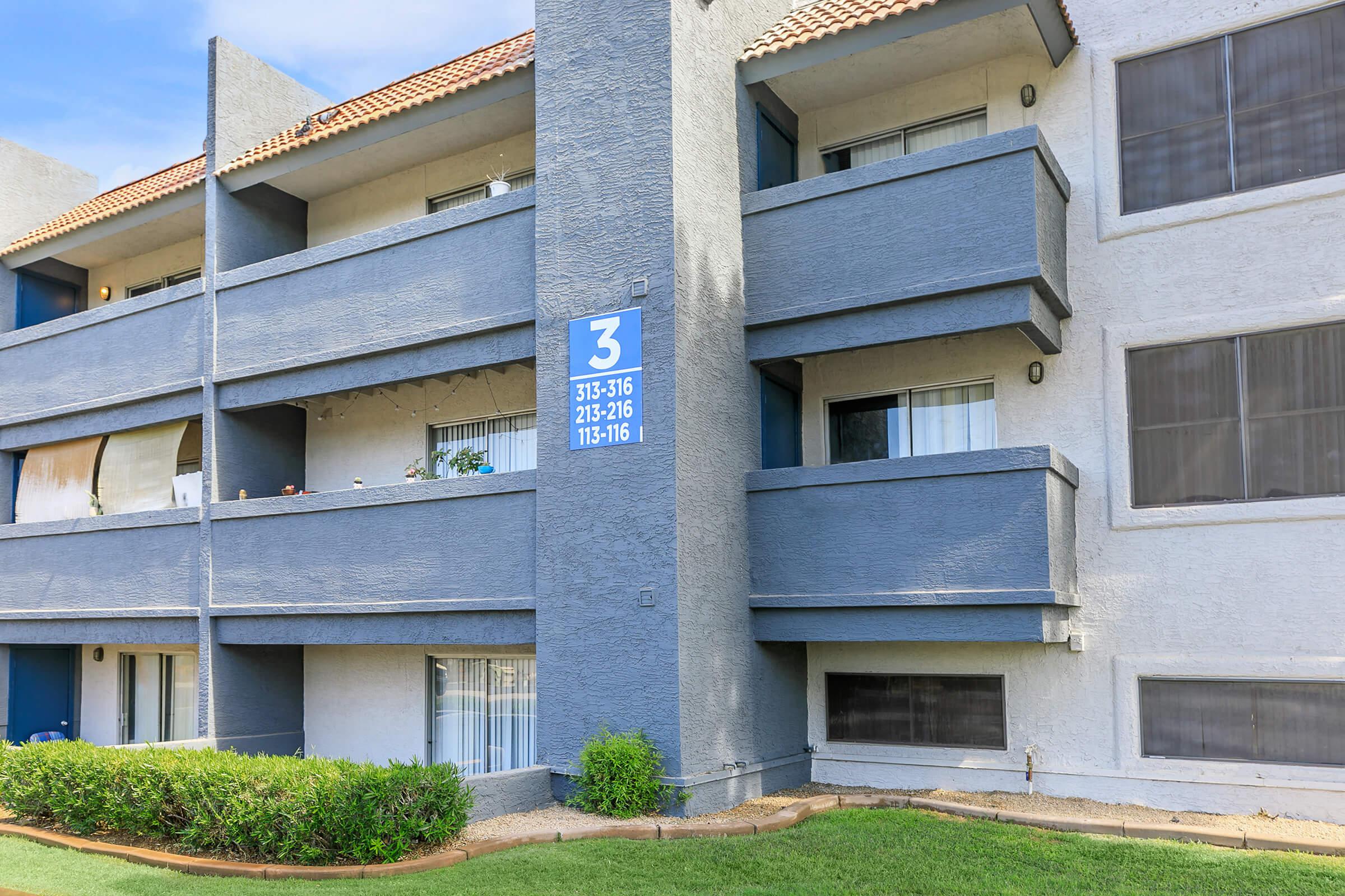 The exterior of building three with balconies at Rise Trailside.