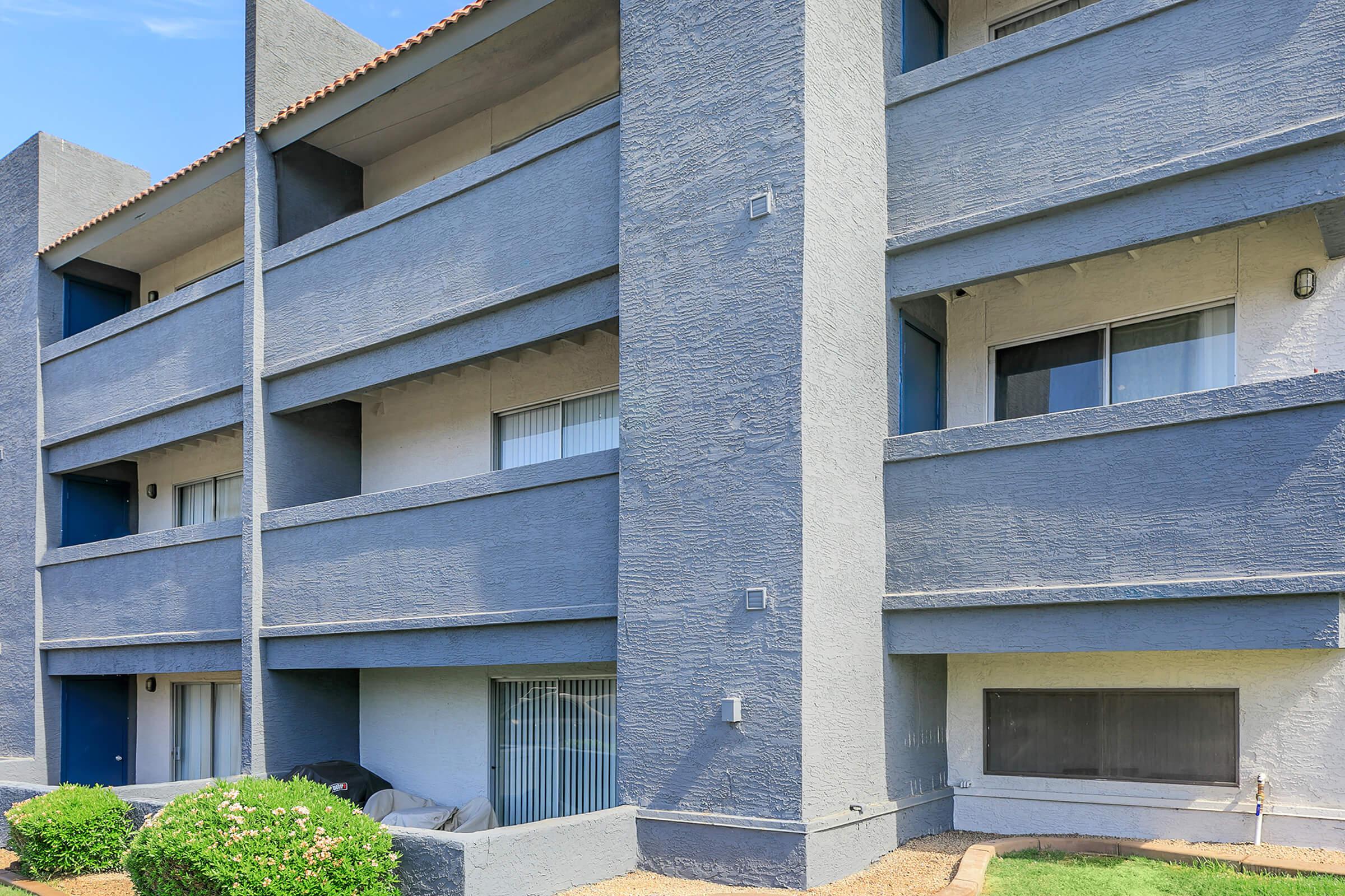 The exterior of the apartment building to Rise Trailside showing the balconies.