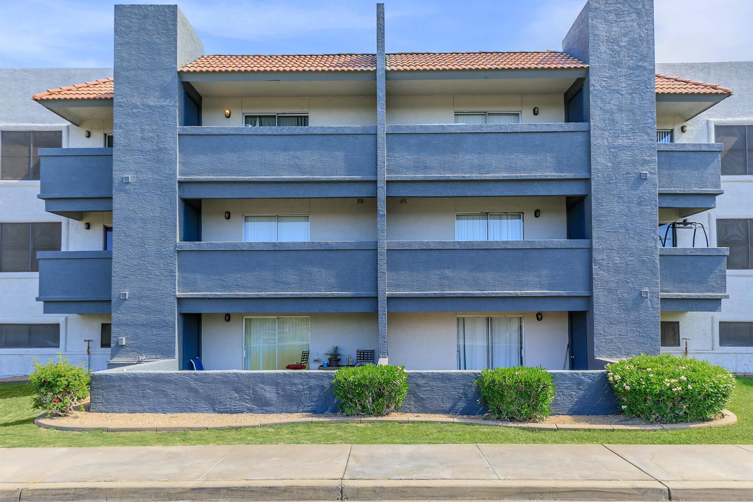 The exterior of the apartment building to Rise Trailside showing the balconies.