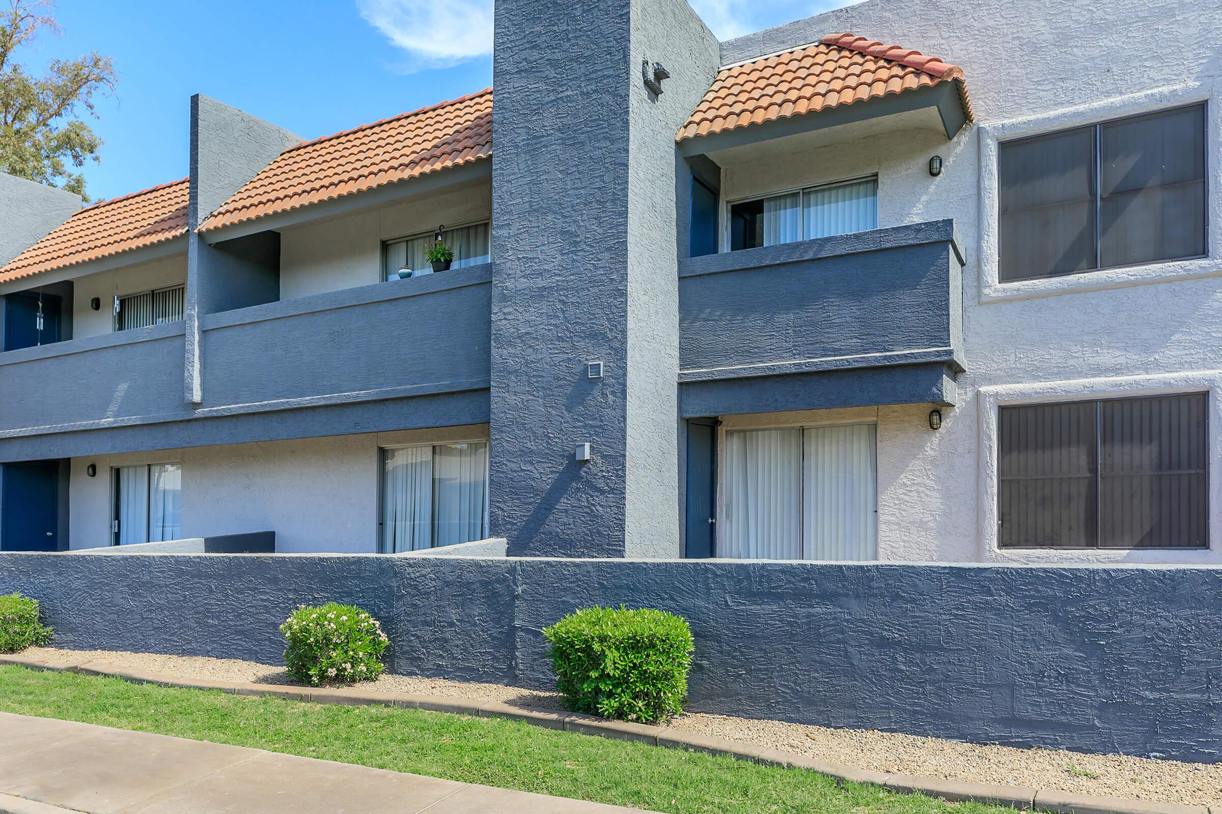 The exterior of the apartment building to Rise Trailside showing the balconies.